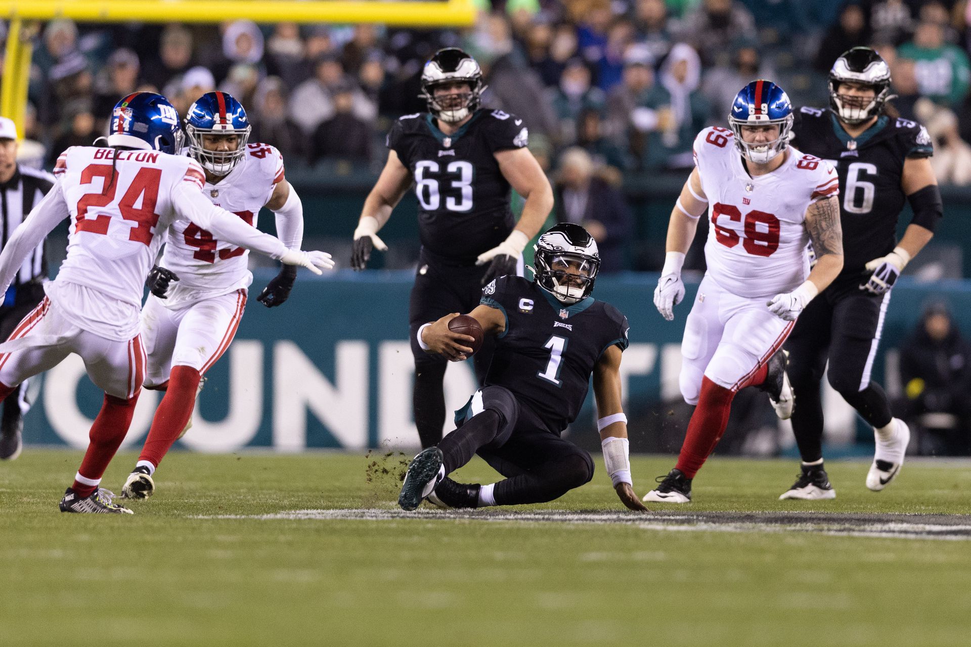 Philadelphia Eagles quarterback Jalen Hurts (1) slides after running the ball against the New York Giants during the third quarter at Lincoln Financial Field in Philadelphia, Pennsylvania,  Jan. 8, 2023.