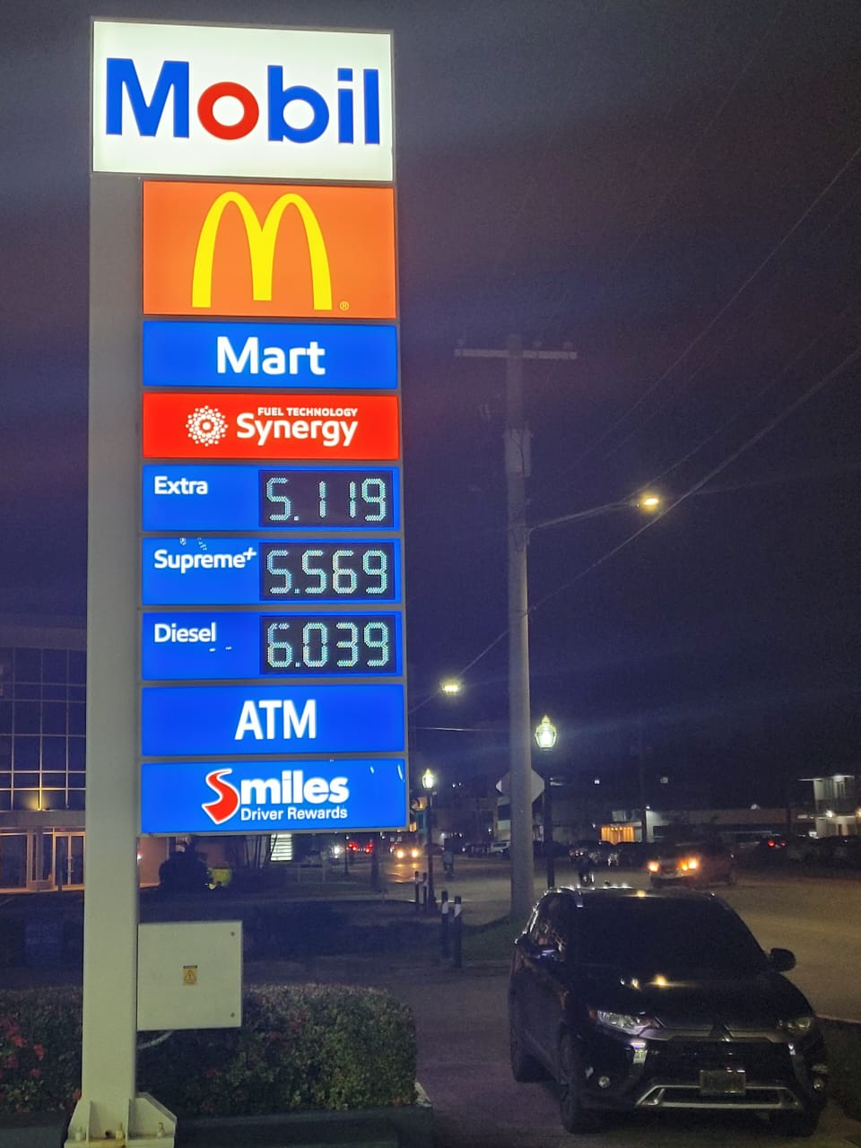 The Mobil Oil station on Beach Road in Garapan displays its prices Tuesday evening.