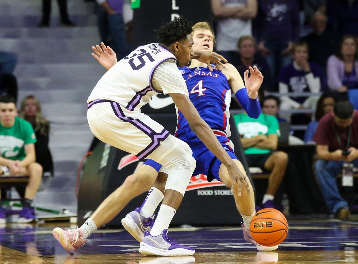 Kansas State Wildcats forward Nae'Qwan Tomlin (35) goes to the basket against Kansas Jayhawks guard Gradey Dick (4) during the second half at Bramlage Coliseum in Manhattan, Kansas, Jan. 17, 2023.