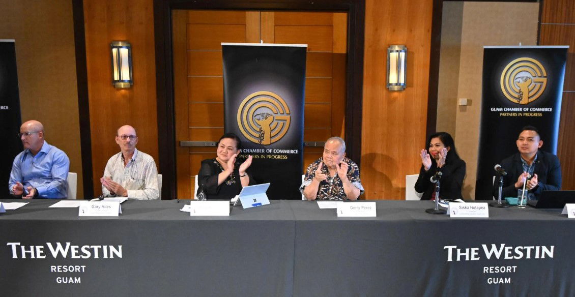 Panel members applaud during the 2023 Guam Economic Forecast meeting held Thursday, Jan. 12, 2023, at the Westin Resort Guam in Tumon. From left are David John, chief executive officer, ASC Trust; Gary Hiles, chief economist, Guam Department of Labor; Claret Ruane, economist; Gerry Perez, vice president, Guam Visitors Bureau; Siska Hutapea, president, Cornerstone Valuation Guam Inc.; and Artemio "Ricky" Hernandez, deputy executive manager, Guam International Airport Authority.