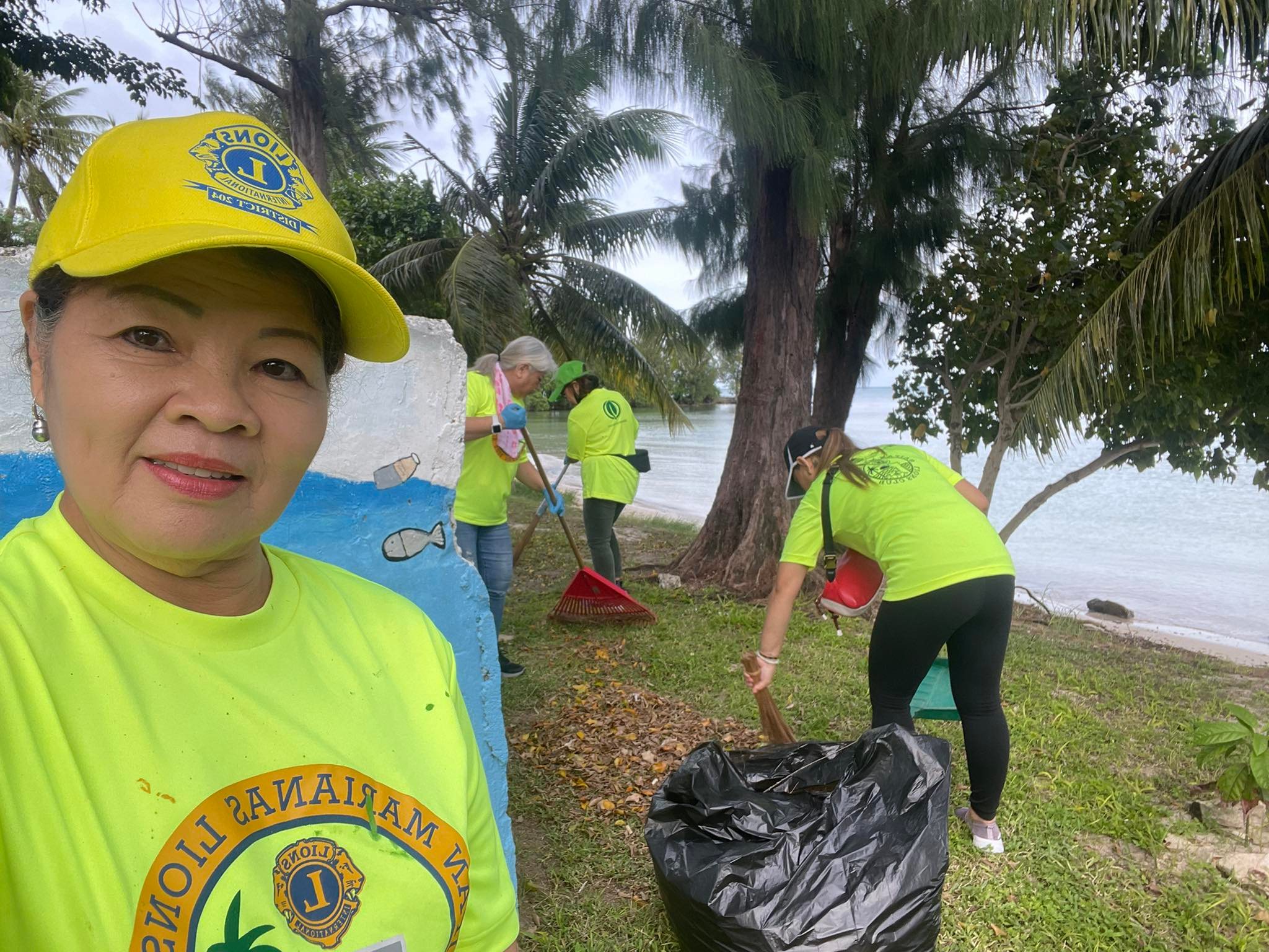 Lolita Velasco and other Saipan Marianas Lions Club members conduct a beach cleanup across from the JP Center in Garapan on Sunday, Jan. 22.
