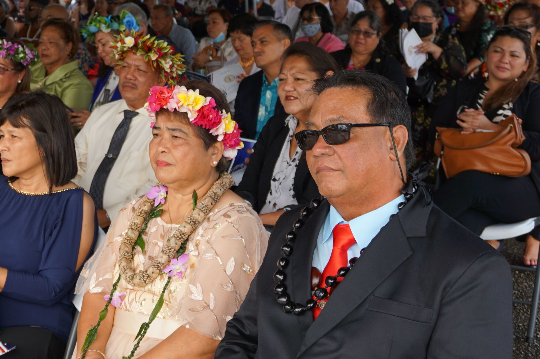 Saipan Mayor Ramon Jose B. Camacho and his wife are among those seated in the crowd during the inauguration of Gov. Arnold I. Palacios and Lt. Gov. David M. Apatang at the multi-purpose center. Also pictured are Tinian Mayor Edwin P. Aldan and former Rep. Leila Staffler.