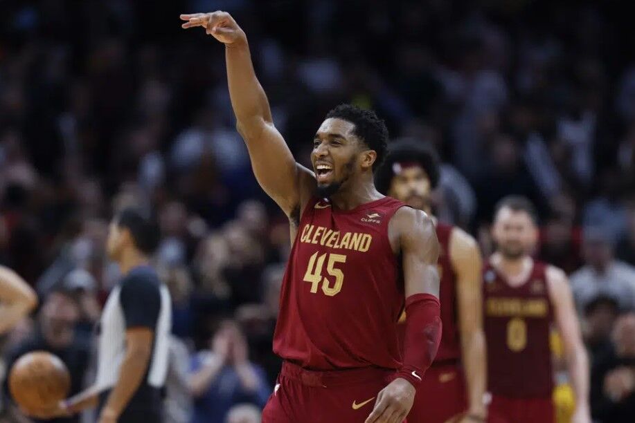 Cleveland Cavaliers guard Donovan Mitchell (45) celebrates after making a basket during the overtime of an NBA basketball game against the Chicago Bulls, Monday, Jan. 2, 2023, in Cleveland.