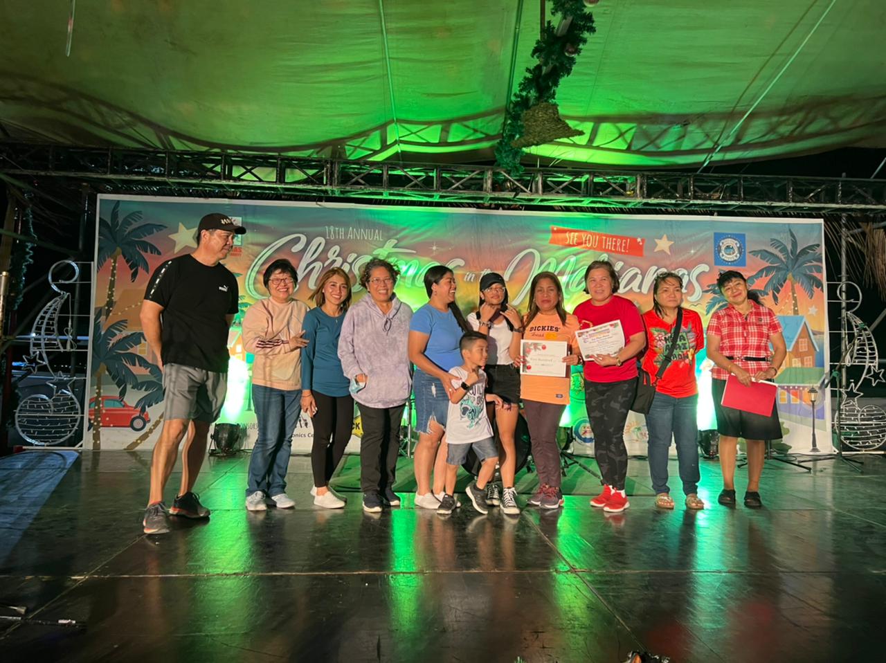 On behalf of the school, Mount Carmel School’s faculty represented its students who won first place in the High School Skit Contest at the Christmas Village in Garapan.