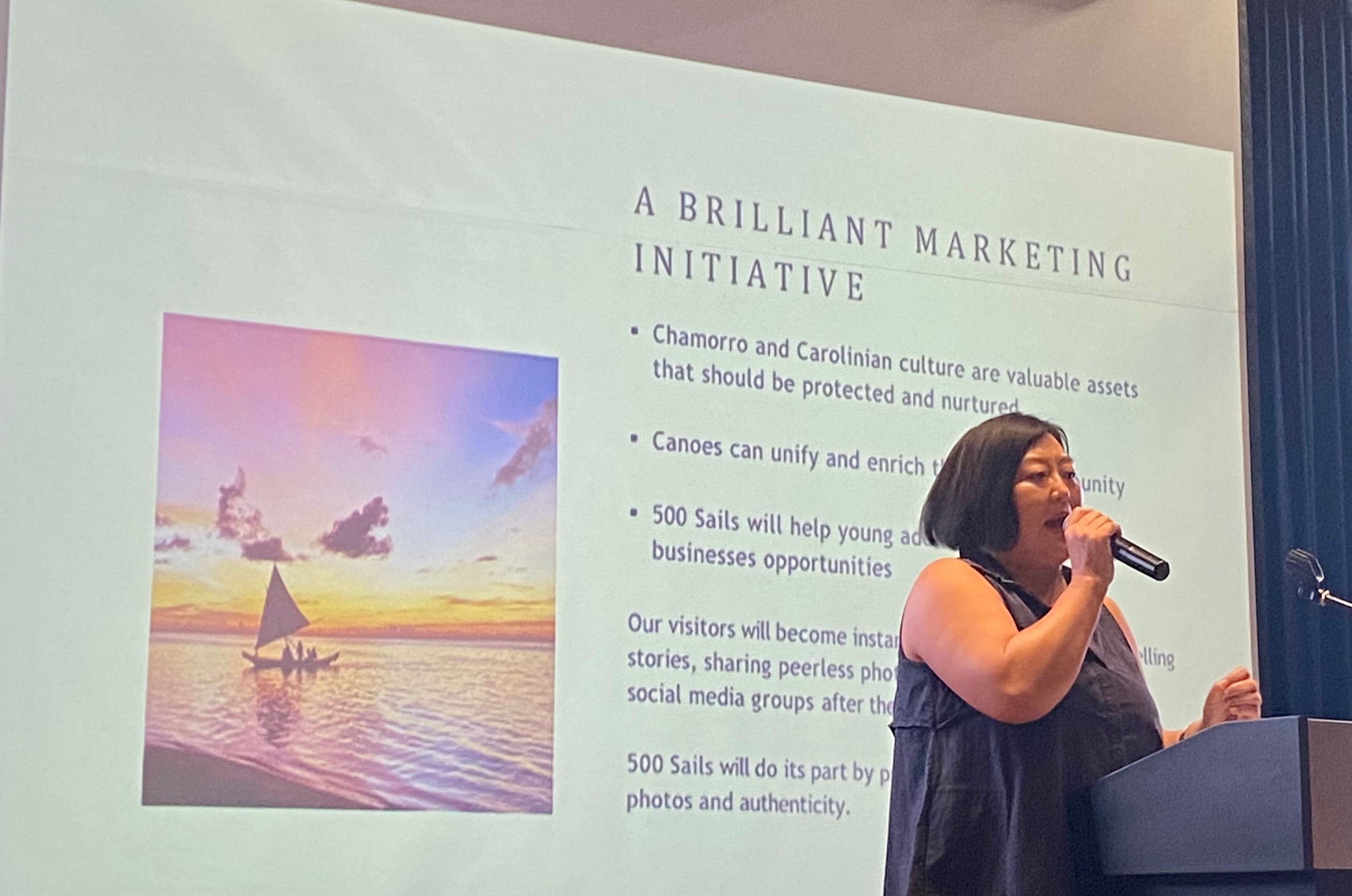 Kuen-Hee Han, managing director of 500 Sails, addresses at the 2023 Marianas Tourism Education Council Tourism Summit with school MY WAVE — Marianas Youth Welcome All Visitors Enthusiastically — Clubs on Jan. 19, 2023, at Kensington Hotel Saipan.