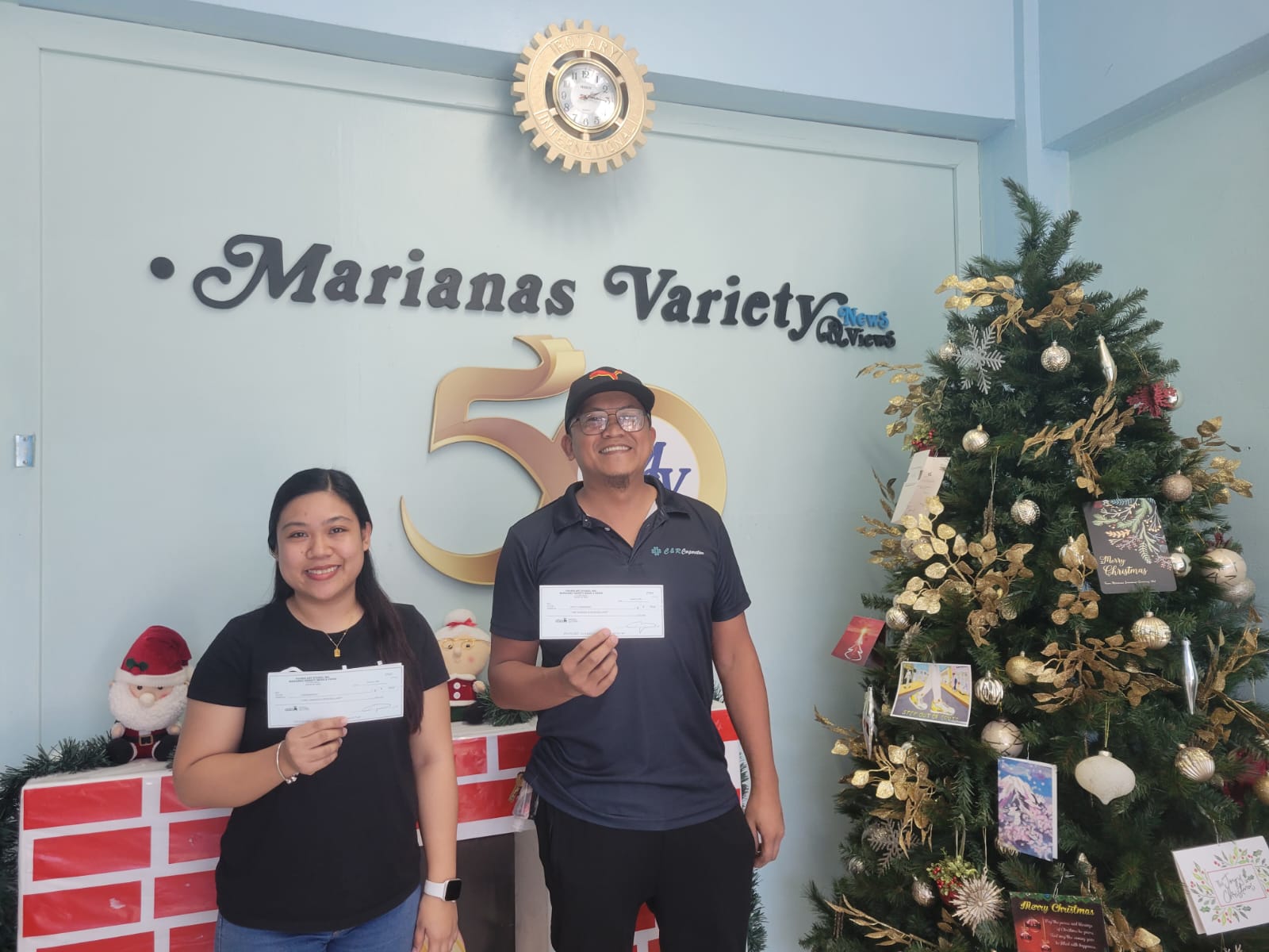 Lea Mendiola and Roy Hernandez each received $100 cash from Marianas Variety and the Marianas Visitors Authority for voting for their favorite places in the Best of the Marianas. They are among the five winners of the raffle draw held on Dec. 29, 2022.