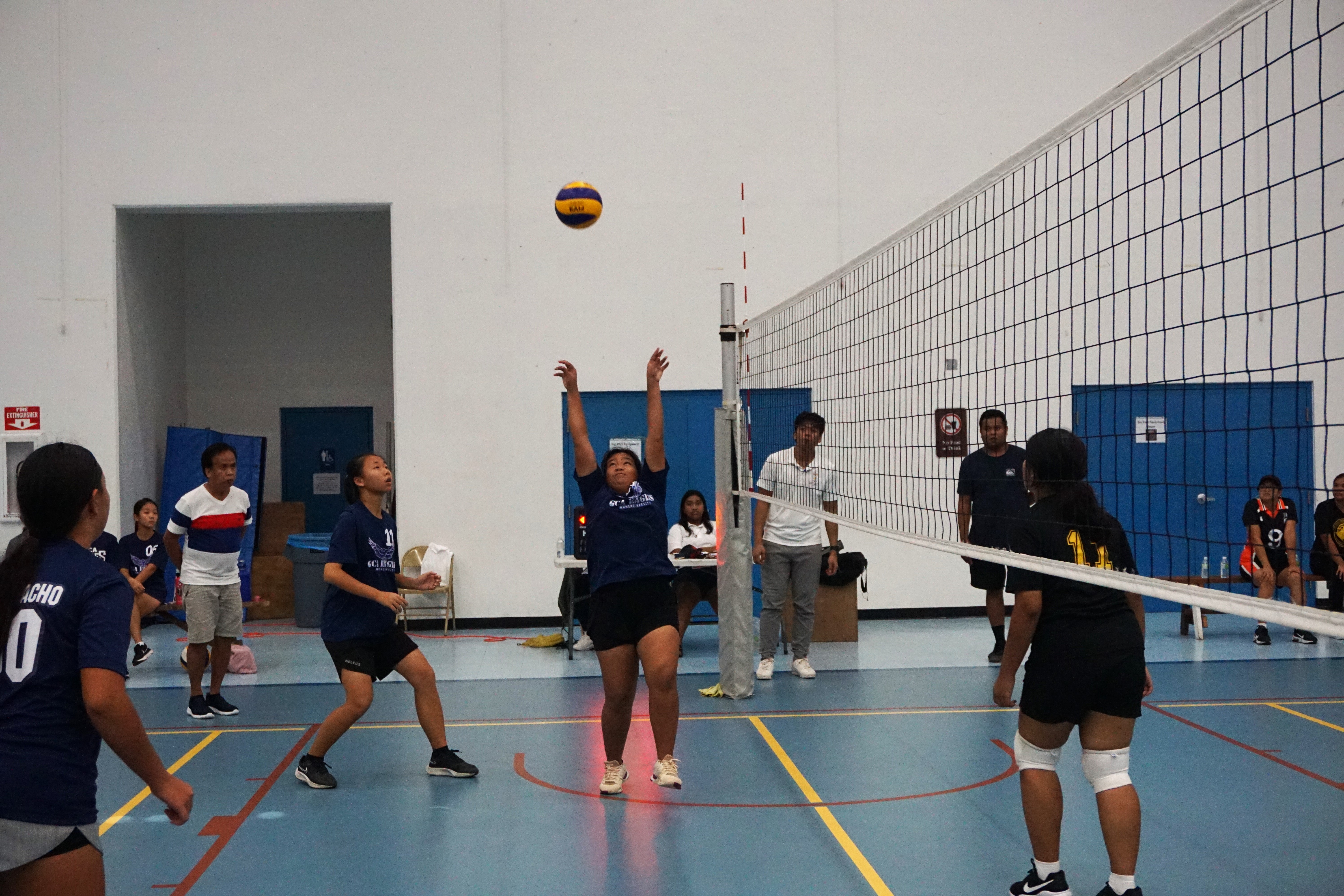 Llyana Libut sets the ball for the play.