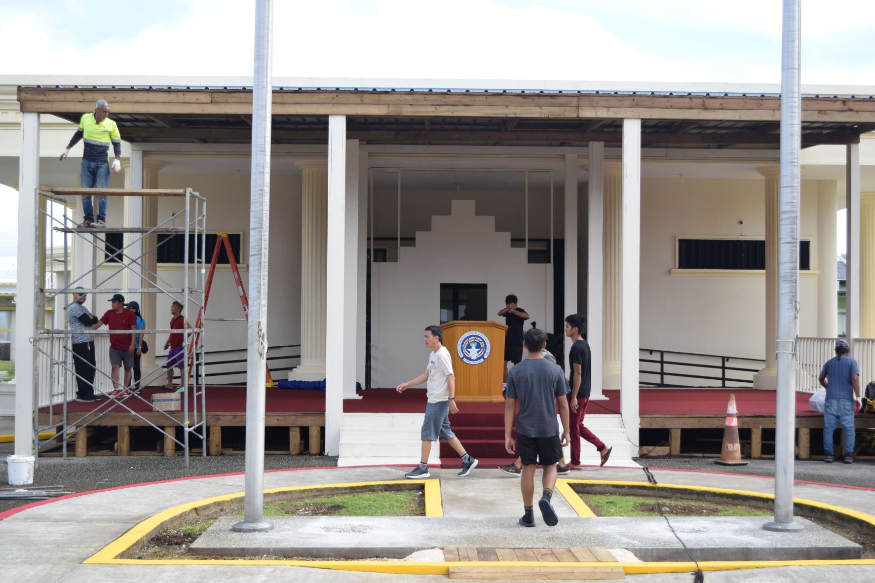 Inauguration organizing staff work to complete the temporary stage for the inauguration of Gov. Arnold I. Palacios and Lt. Gov. David M. Apatang at 10 a.m. today, Monday, at the Governor Pedro P. Tenorio Multi-Purpose Center in Susupe.