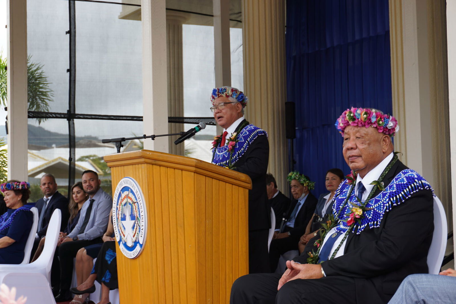 Gov. Arnold I. Palacios, center, delivers his inaugural address at the multi-purpose center, Monday morning, in Susupe, Saipan. Also in photo: Lt. Gov. David M. Apatang, right.