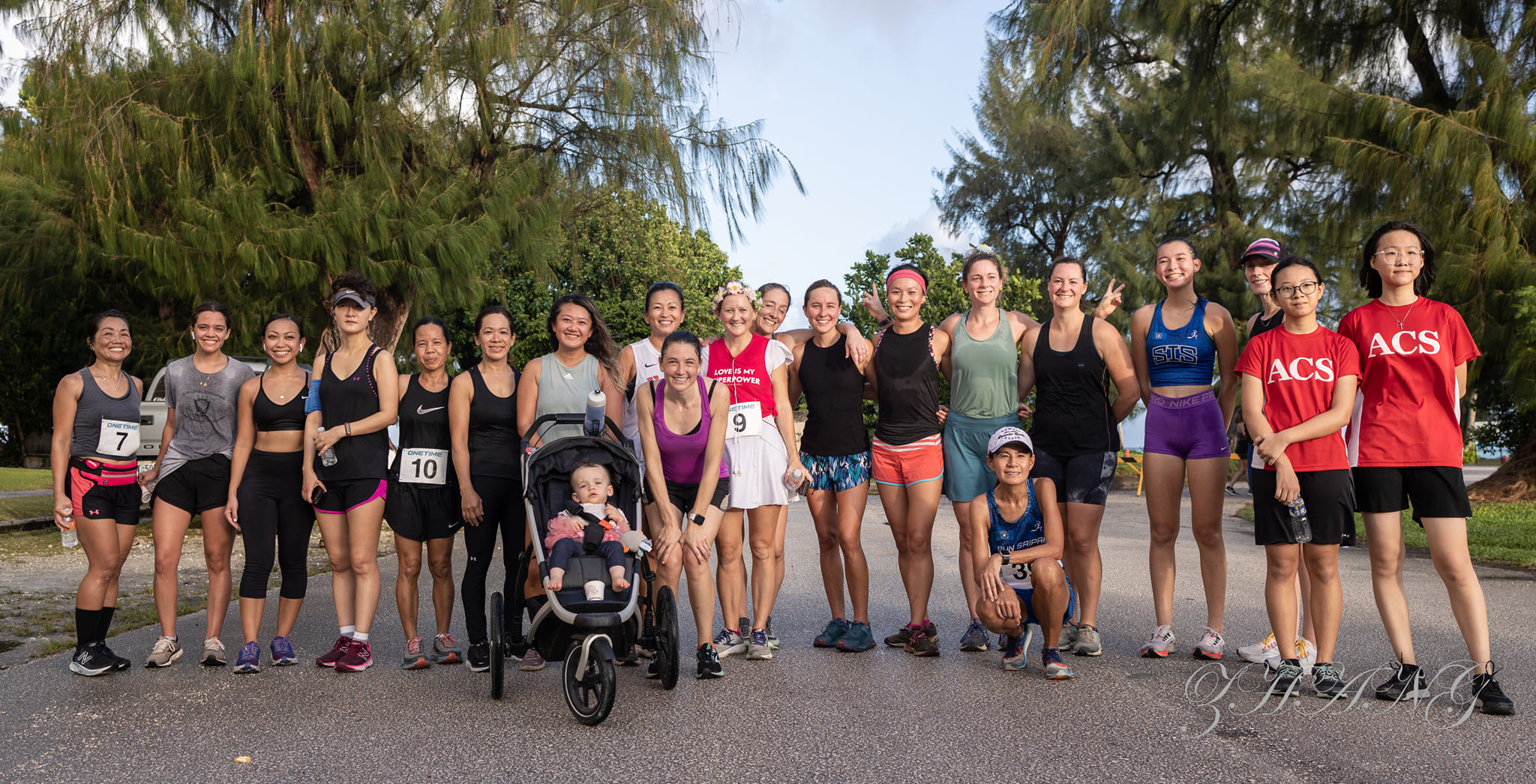 Participants pose for a group photo after completing the 2022 NMI Women's 10km Run.