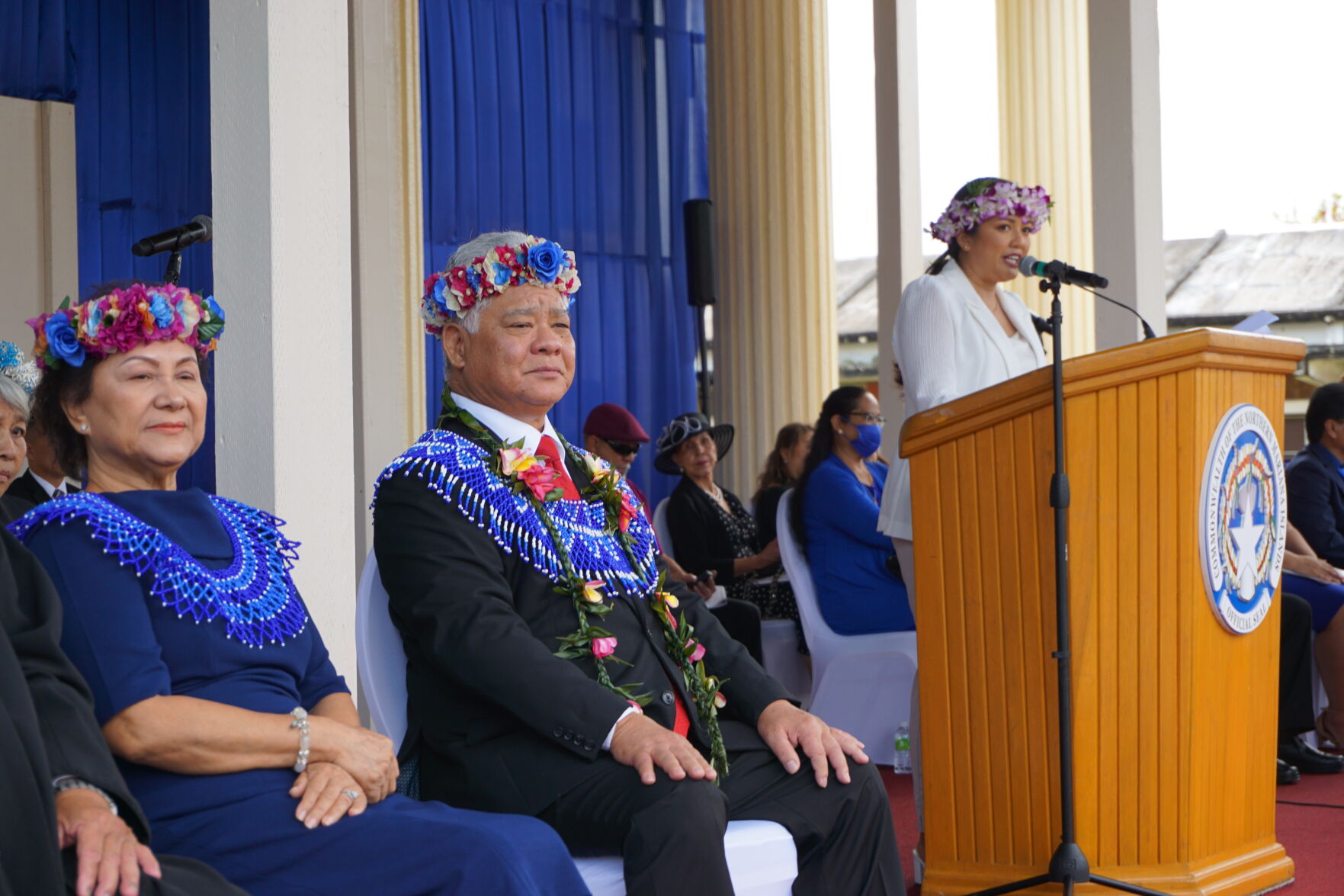 Gov. Arnold I. Palacios and first lady Wella S. Palacios listen as mistress of ceremonies Patricia Coleman speaks.