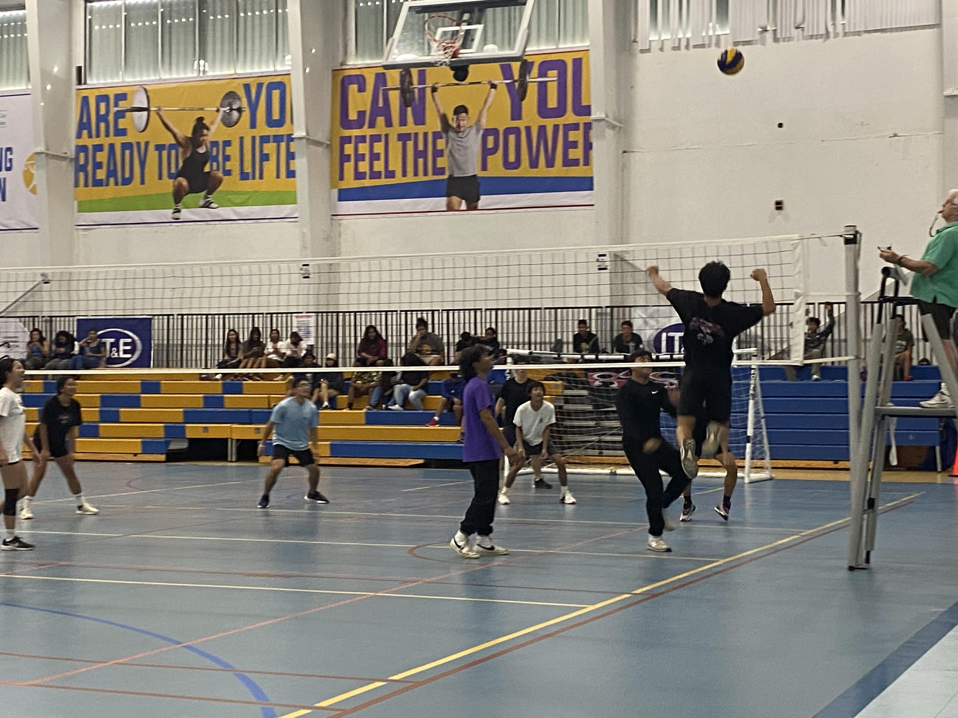 A player rises up for the spike during a game of Roccball between Nakama and Sufa at the MHS gym.