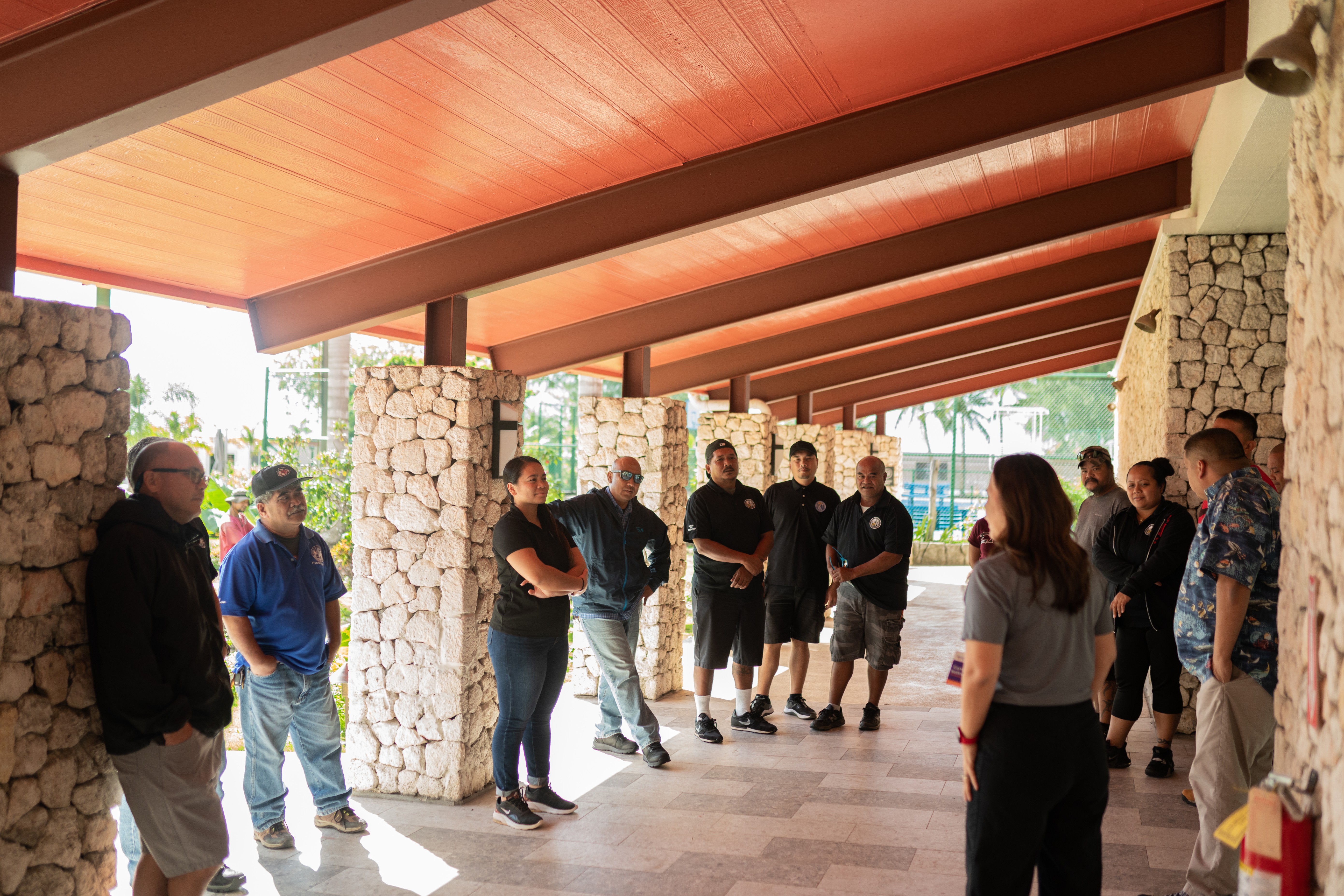 Participants engage in a discussion during the training at the Crowne Plaza Resort Saipan.