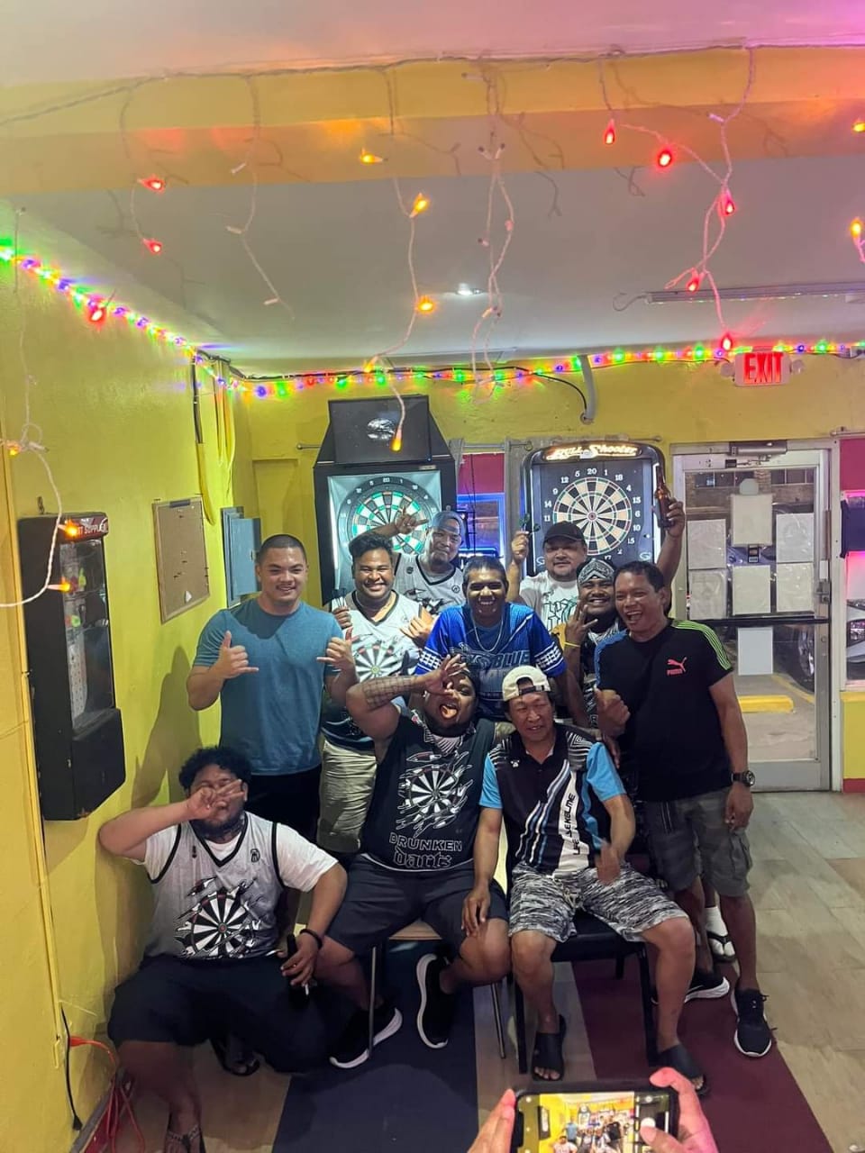 Tambayan Drunken Dartz team members pose for a photo after winning the Division “C” Bud Light Cup of the SEDA Bud Light Dart League on Wednesday at Tambayan Bar.