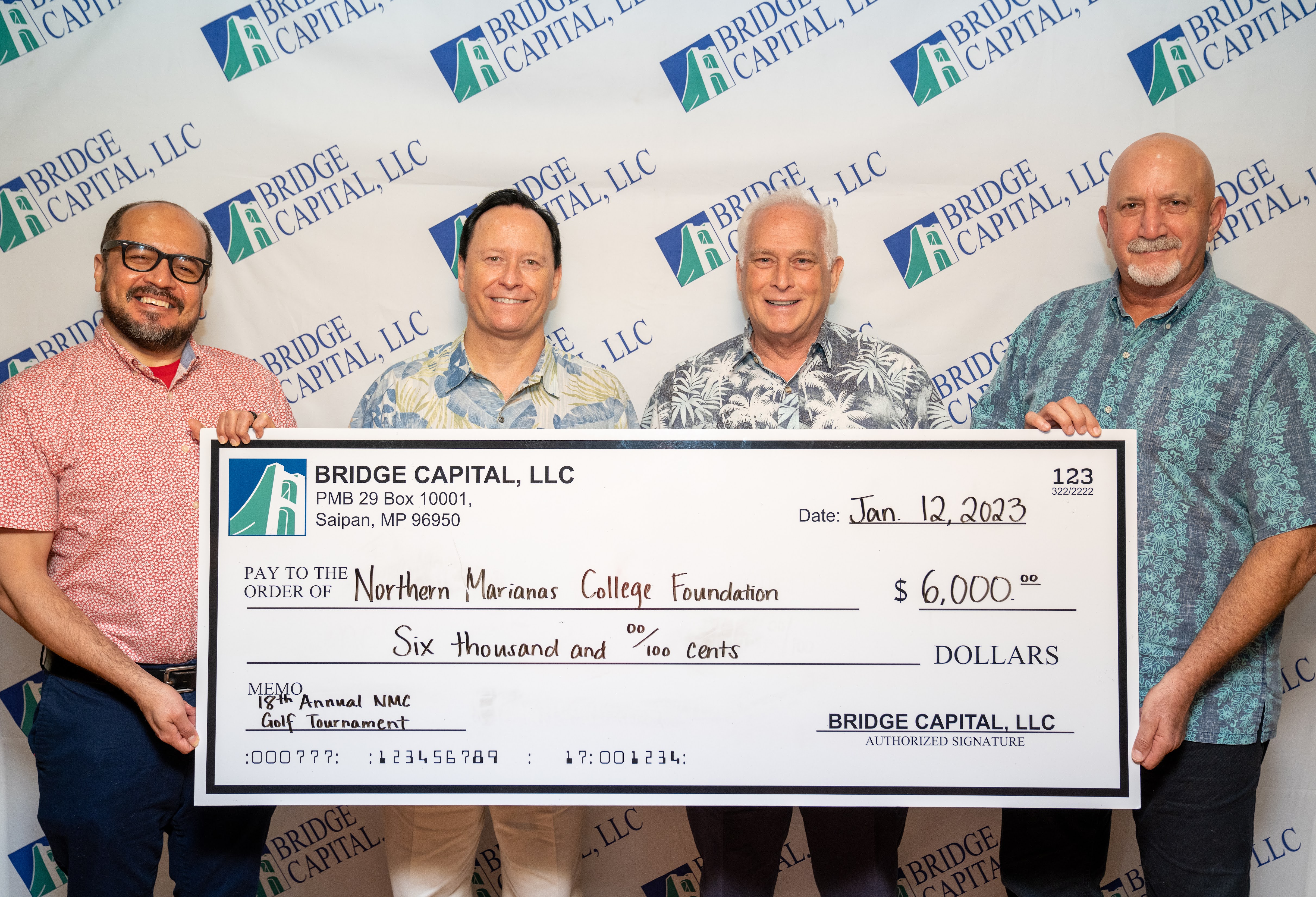 Bridge Capital LLC recently donated $6,000 in cash and prizes to the Northern Marianas College Foundation in support of its Golf Open on March 18 and 19, 2023, at the LaoLao Bay Golf and Resort. In photo from left is NMC President Galvin Deleon Guerrero, EdD, Bridge Capital Vice Chairman and Director Shawn Scott, Bridge Capital CEO John Baldwin, and Bridge Capital Vice President Bart Jackson.