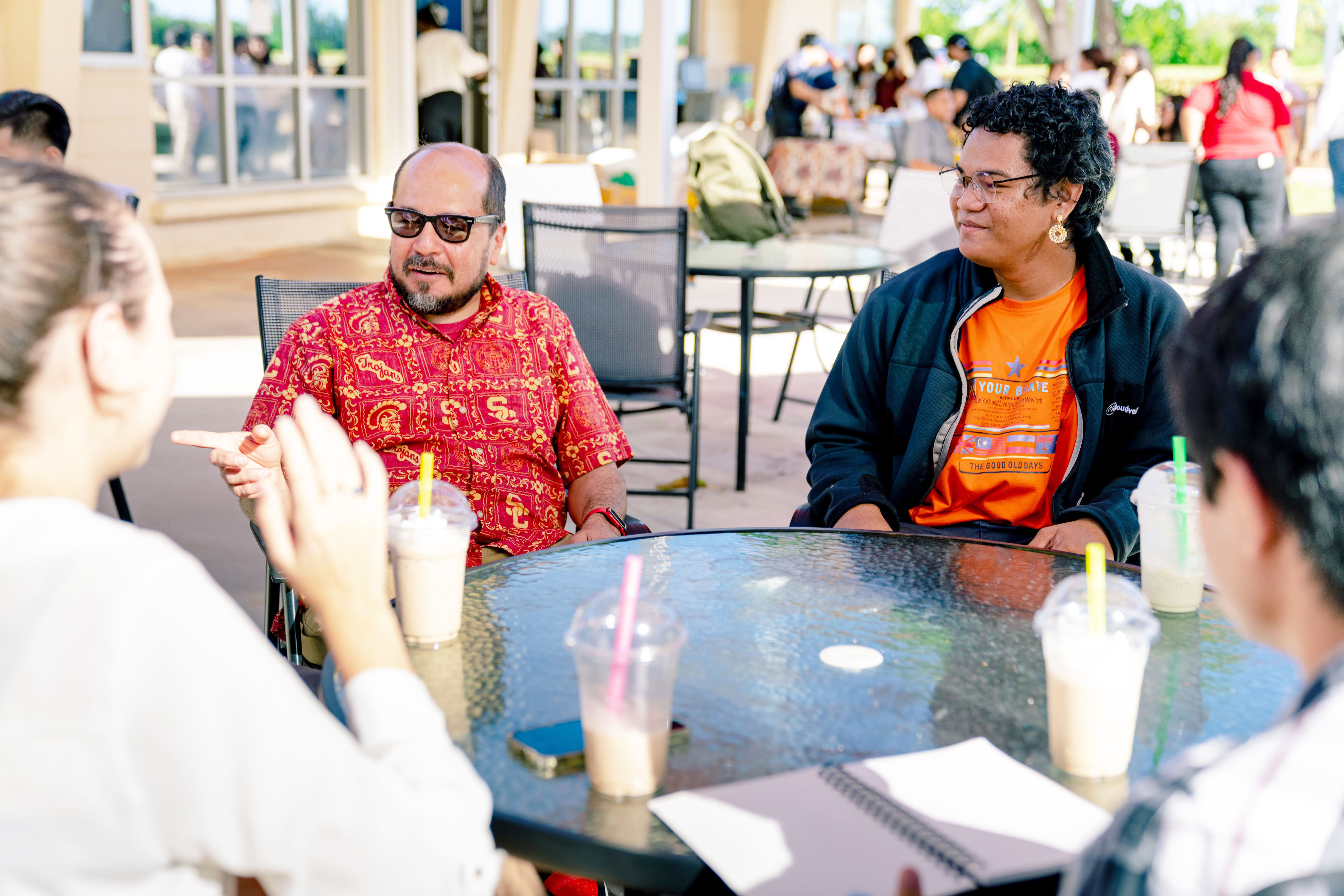 Northern Marianas College President Galvin Deleon Guerrero, EdD, talks with NMC students on Wednesday during Welcome Week at the college.