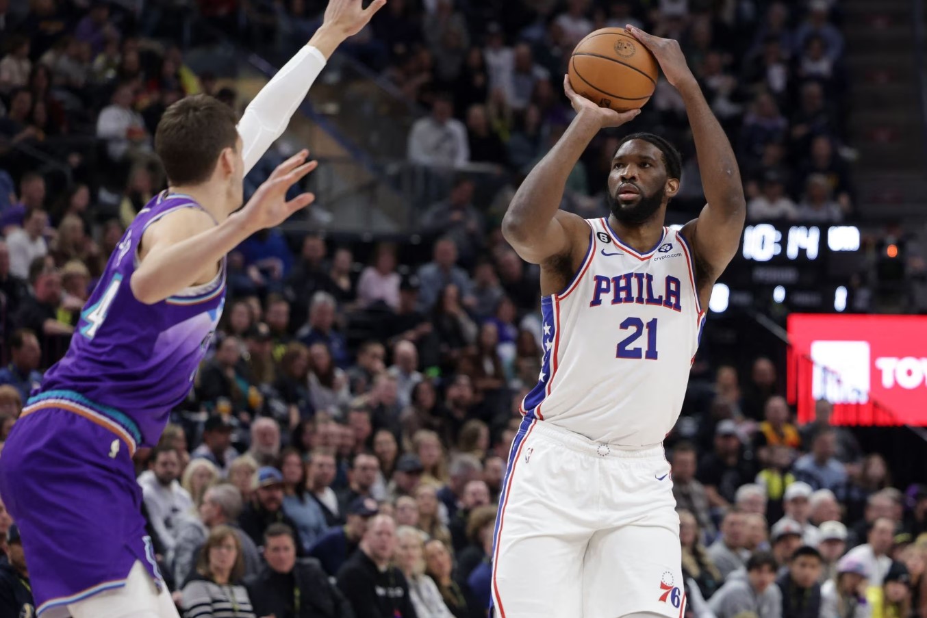 Philadelphia 76ers center Joel Embiid (21) shoots a jump shot past Utah Jazz center Walker Kessler (24) during the first quarter at Vivint Arena in Salt Lake City, Utah, [1/5] Jan. 14, 2023.