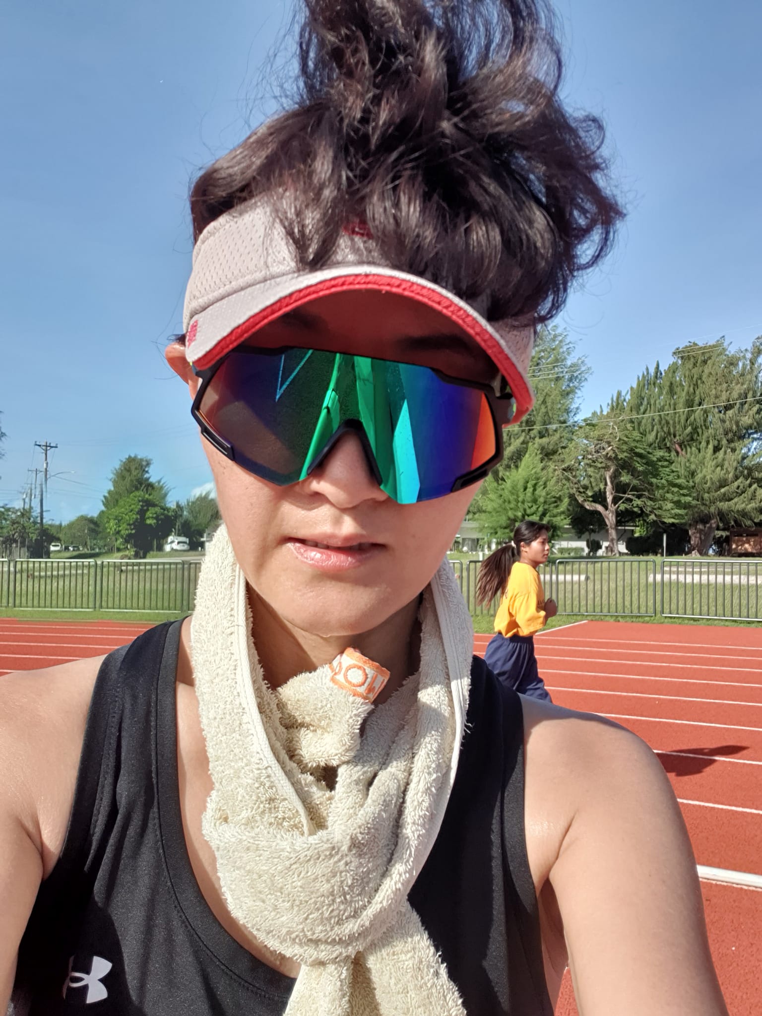 Ann Bang takes a selfie after completing the 42K challenge in 105 laps at the Oleai Sports Complex on Saturday morning.