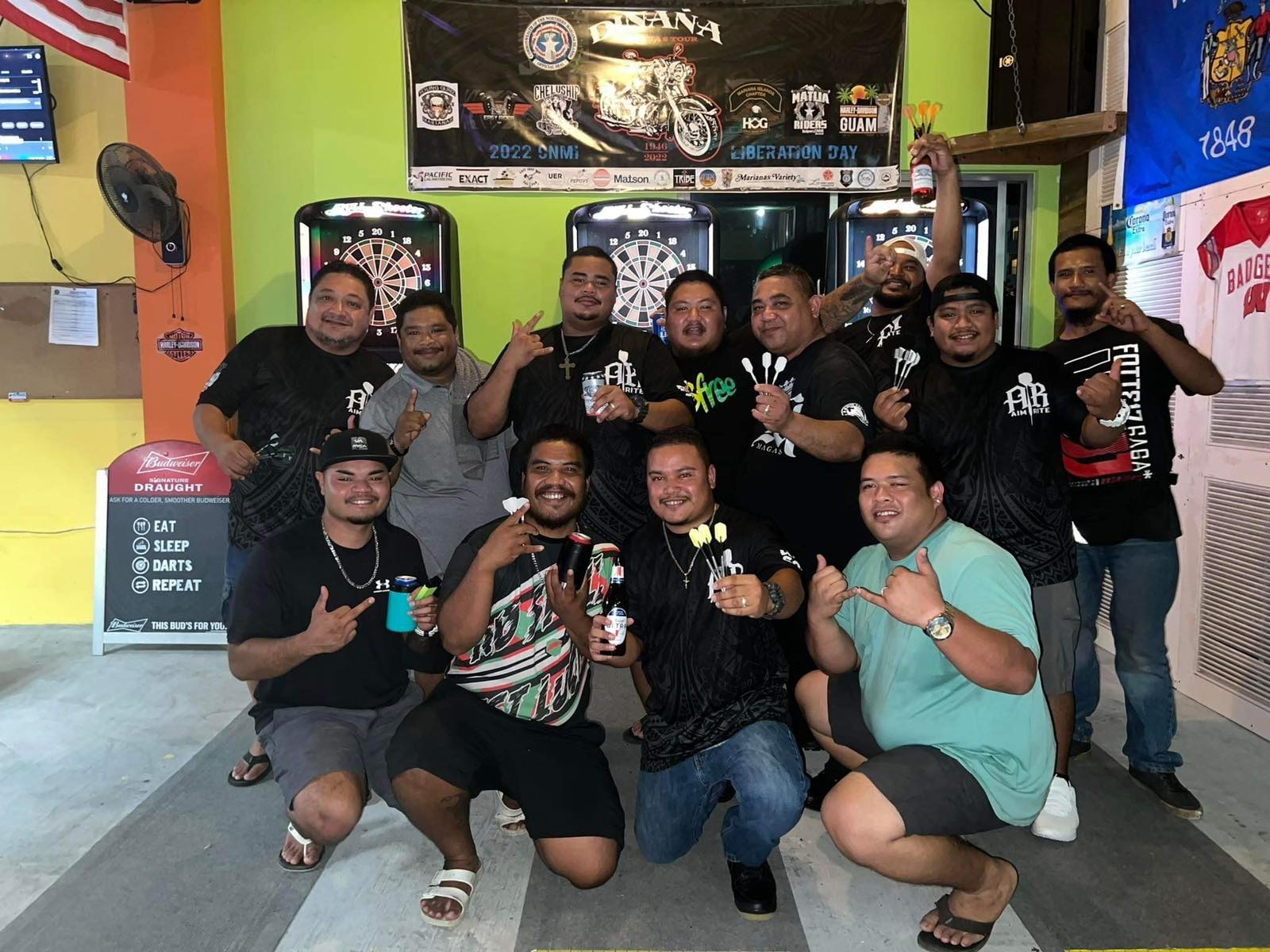 Oleai Aimrite team members pose for a photo after winning the Division “B” Bud Light Cup of the SEDA Bud Light Dart League on Tuesday at the Last Shot Bar.