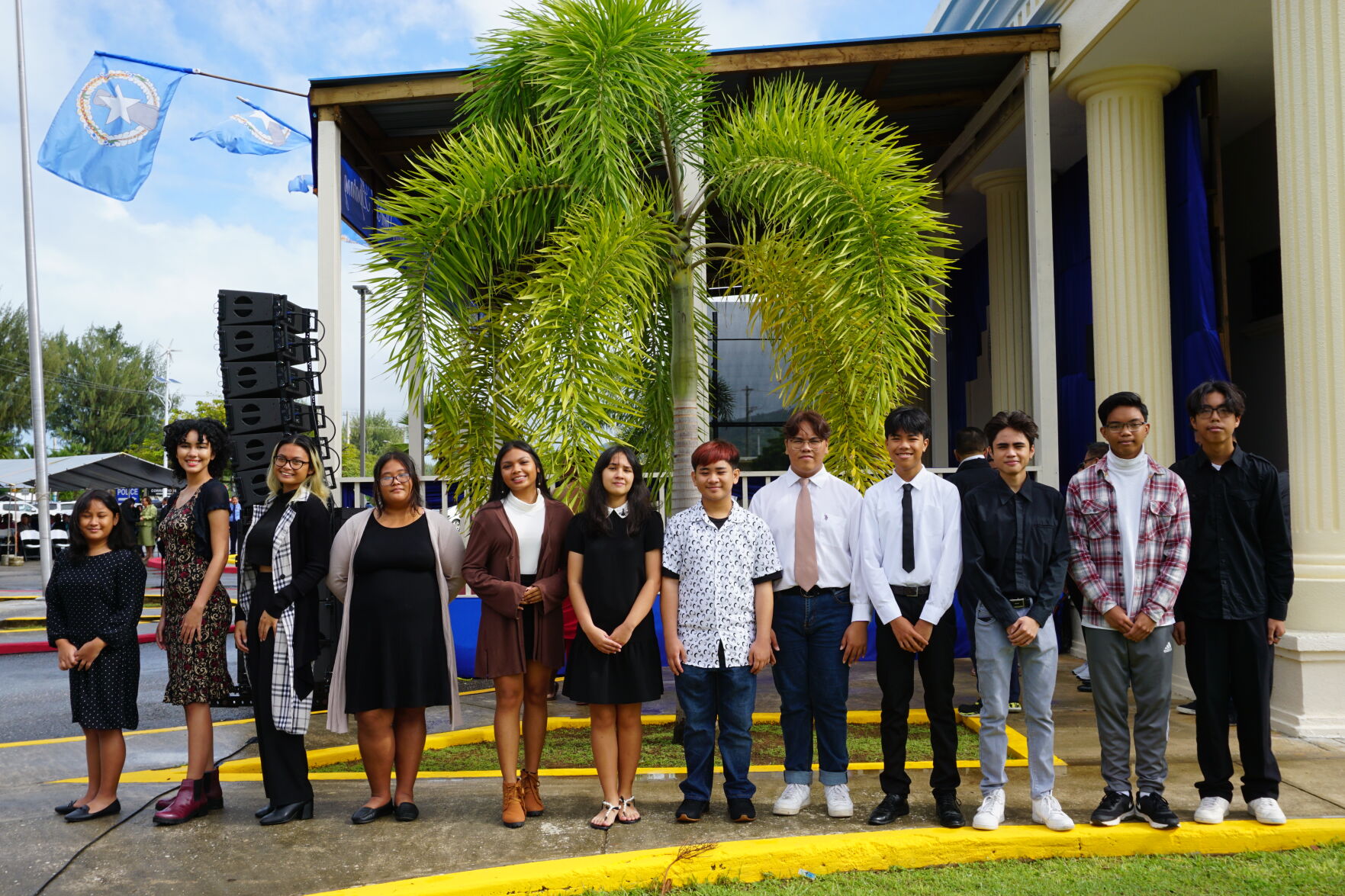 The Marianas High School Rhythm 'N Harmony Glee Club members pose for a photo ahead of singing the national and CNMI anthems.