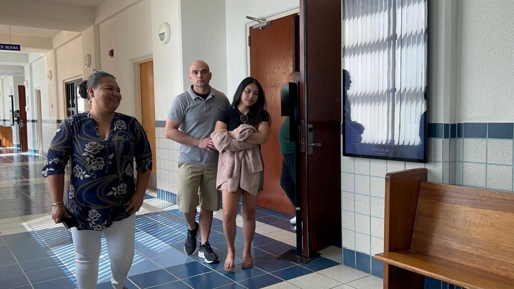 Joseph White and a family member leave the courtroom on Tuesday.