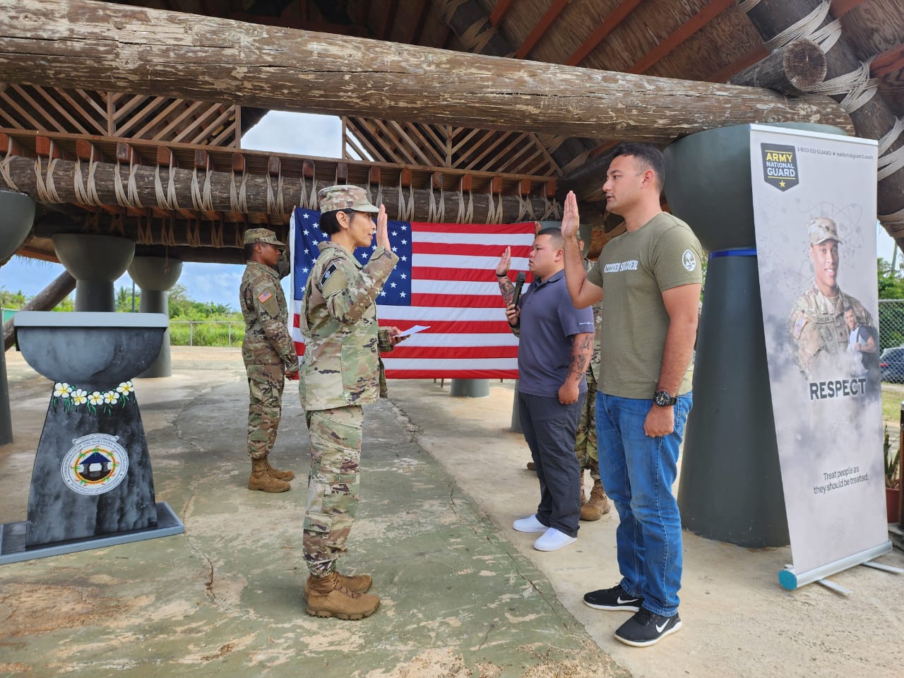 Vincent Taitano and Jose Quitano enlisted as members of the U.S. Army National Guard at San Vicente Central Park on Sunday.