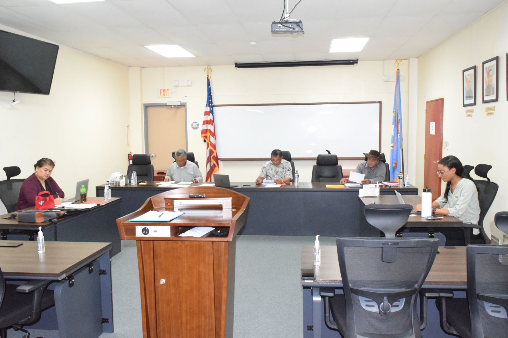 Commonwealth Casino Commission acting Chairman Ralph Demapan, center, Commissioners Mario Taitano, second left, Ramon Dela Cruz, second right, executive assistant to the commission Ruth Ann P. Sakisat, left, and Assistant Attorney General Keisha Blaise, right, hold a meeting on Thursday in the commission's conference room at Springs Plaza in Gualo Rai.