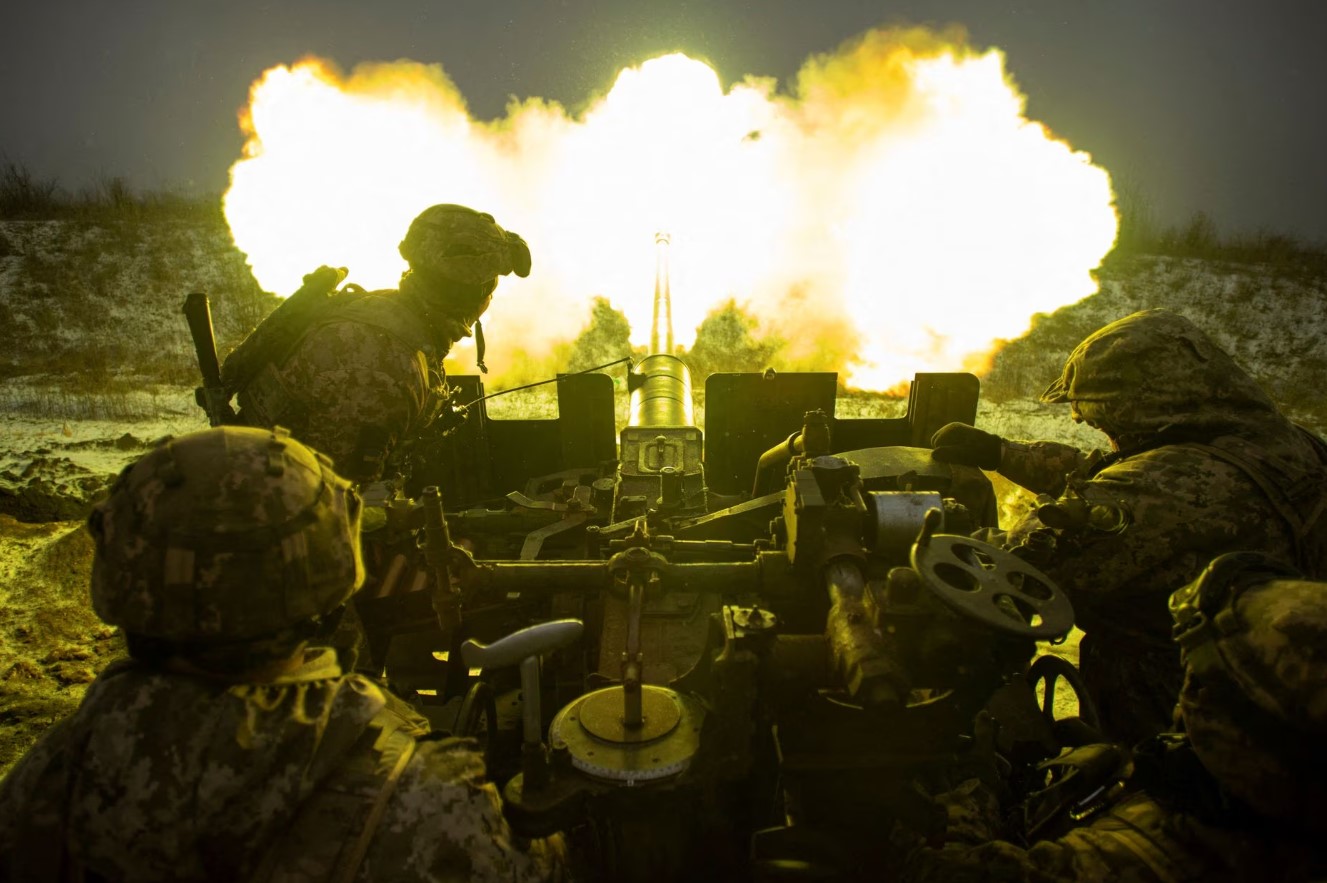Ukrainian servicemen fire an anti-aircraft gun towards Russian positions on a frontline near the town of Bakhmut, amid Russia's attack on Ukraine, in Donetsk region, Ukraine, Jan. 15, 2023.