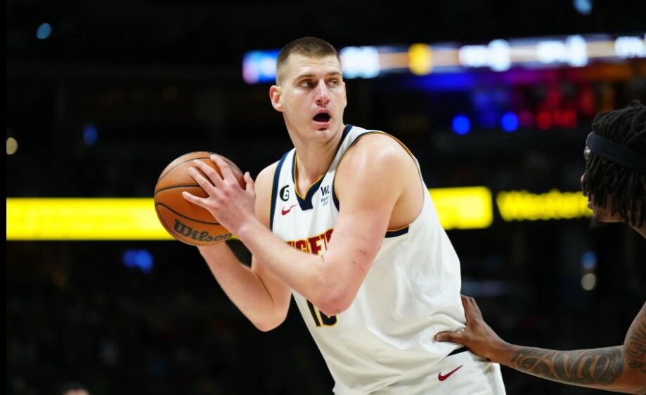 Denver Nuggets center Nikola Jokic (15) controls the ball in the second quarter against the Boston Celtics at Ball Arena in Denver, Colorado, Jan. 1, 2023.