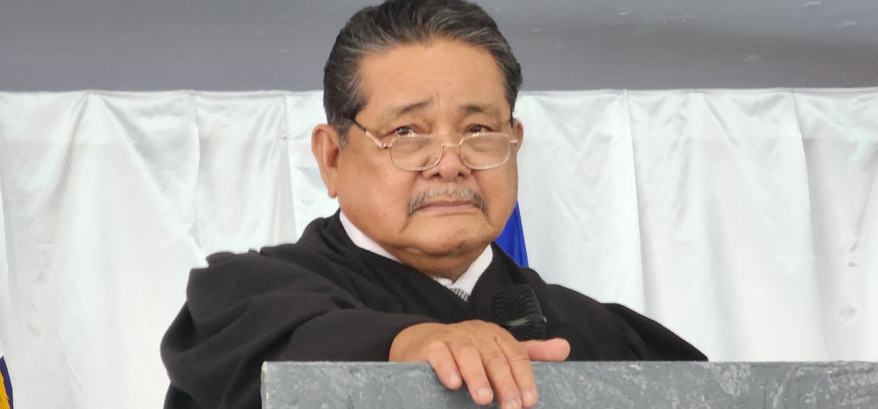 Chief Justice Alexandro C. Castro prepares to administer the oath to Rota Mayor Aubry M. Hocog.