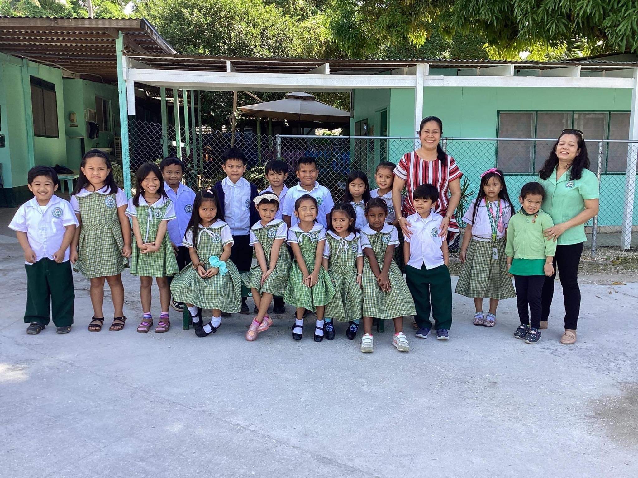Winners of the kinder 5-2nd grade division with their coaches.