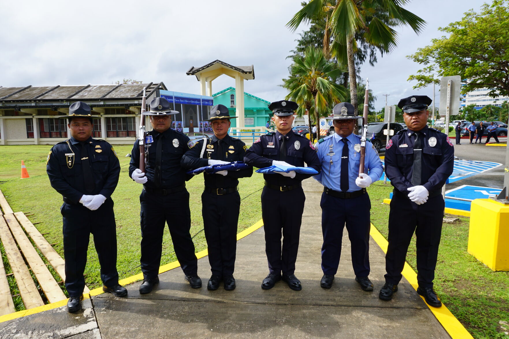 The CNMI Color Guard, comprised of representatives from each local law enforcement entity, poses for a photo ahead of the gubernatorial inauguration ceremony at the multi-purpose center on Monday. 