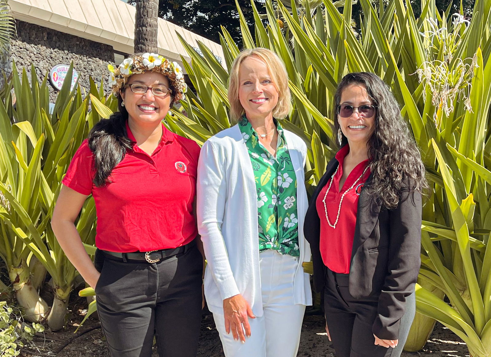 Northern Marianas College-Cooperative Research, Extension, and Education Services Interim Dean Patty Coleman, left, and NMC-CREES Family, Community, and Youth Development State Program Leader Tayna Belyeu-Camacho, right, pose for a photo with Jennifer Sirangelo, president and CEO of the National 4-H Council.