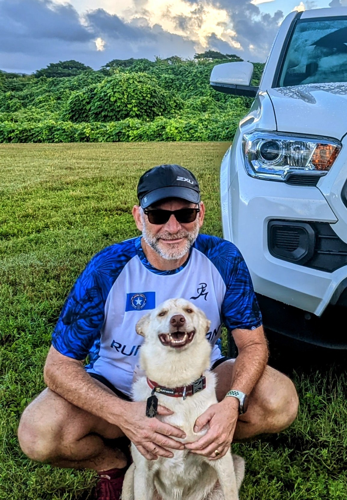 Dr. Ron Snyder and his dog Gilligan pose for a photo after completing the 8K distance of  Run Saipan’s first Saipan International Airport Trail Run on Nov. 12, 2022.