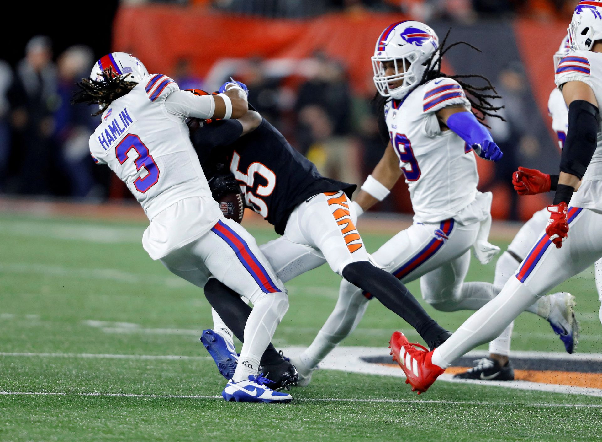 Buffalo Bills safety Damar Hamlin (3) makes the tackle on Cincinnati Bengals wide receiver Tee Higgins (85) during the first quarter at Paycor Stadium. The play led to Hamlin collapsing on the field, and being taken to the hospital in critical condition in Cincinnati, Ohio on Jan. 2, 2023.