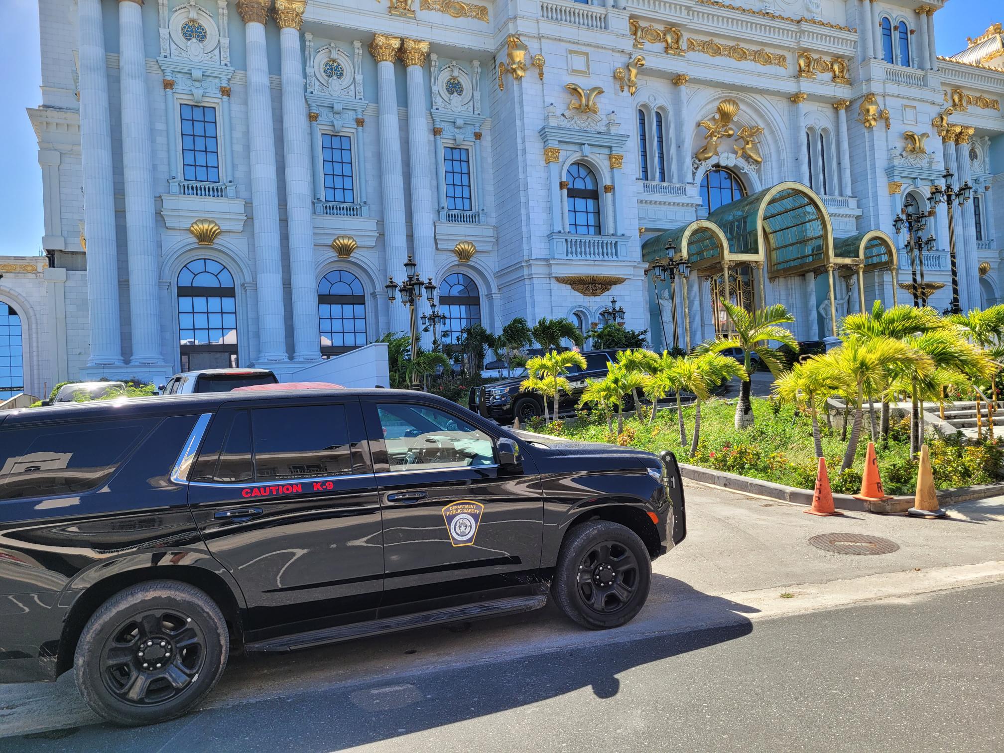 Department of Public Safety-Direct Action Response Team officers conduct a search operation for two theft suspects in the Imperial Pacific International hotel-casino building on Friday morning.