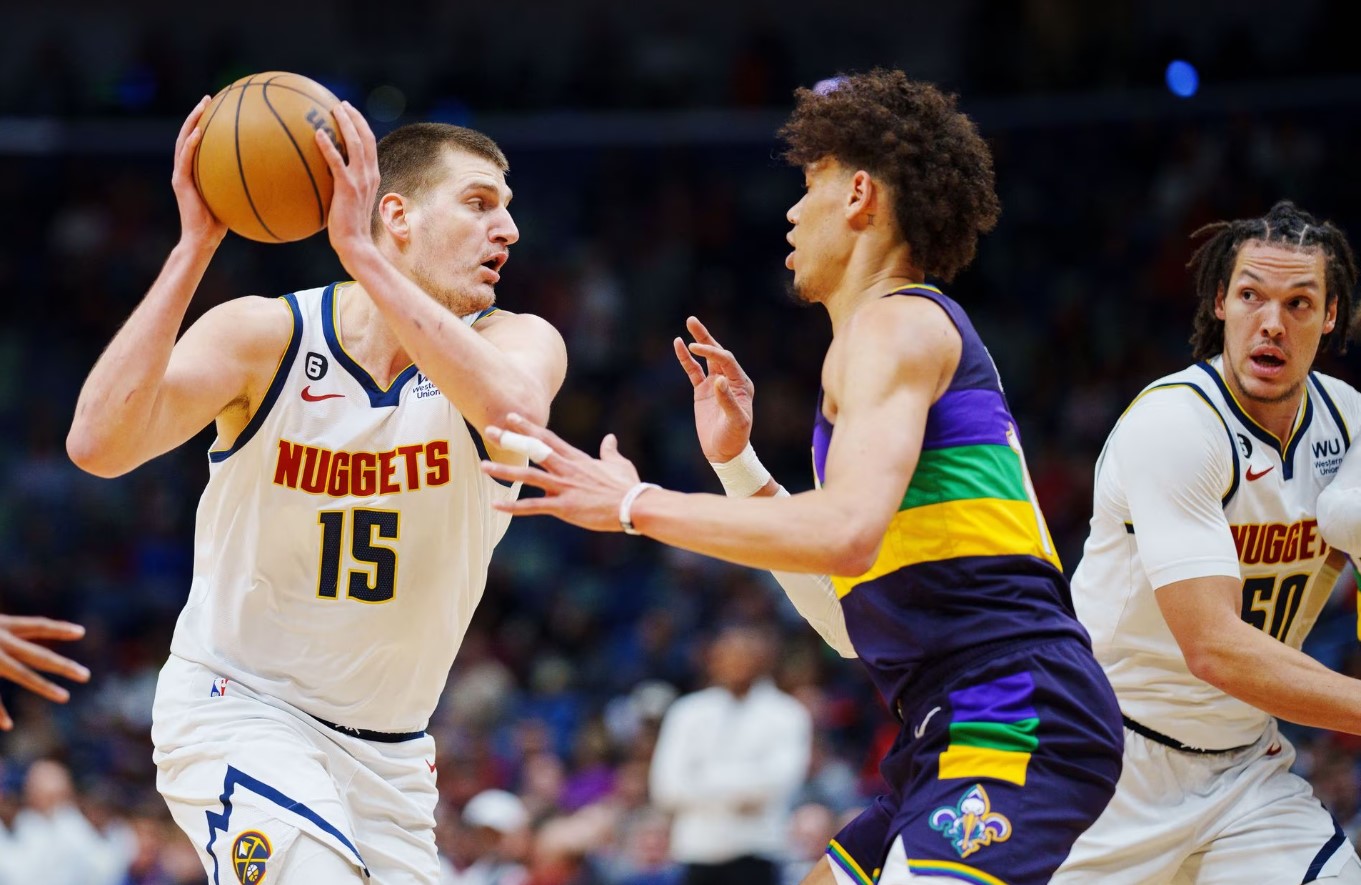 Denver Nuggets center Nikola Jokic (15) fights for position against New Orleans Pelicans center Jaxson Hayes (10) during the first quarter at Smoothie King Center in New Orleans, Louisiana, Jan. 24, 2023.