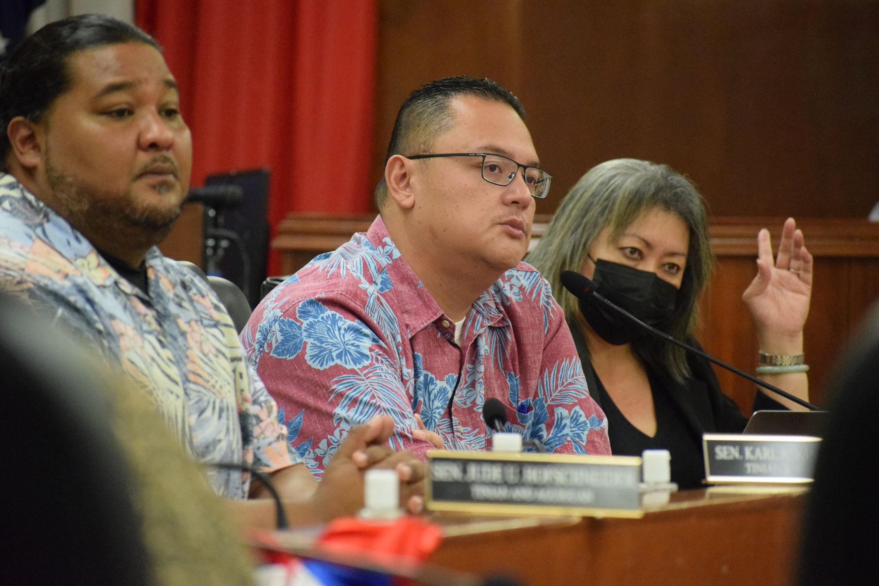 Senate President Edith Deleon Guerrero raises her hand as Senate Vice President Donald Manglona and Sen. Karl King-Nabors look on during a Senate joint committee meeting with Marianas Visitor Authority and Commonwealth Ports Authority officials in the Senate chamber on  Wednesday.