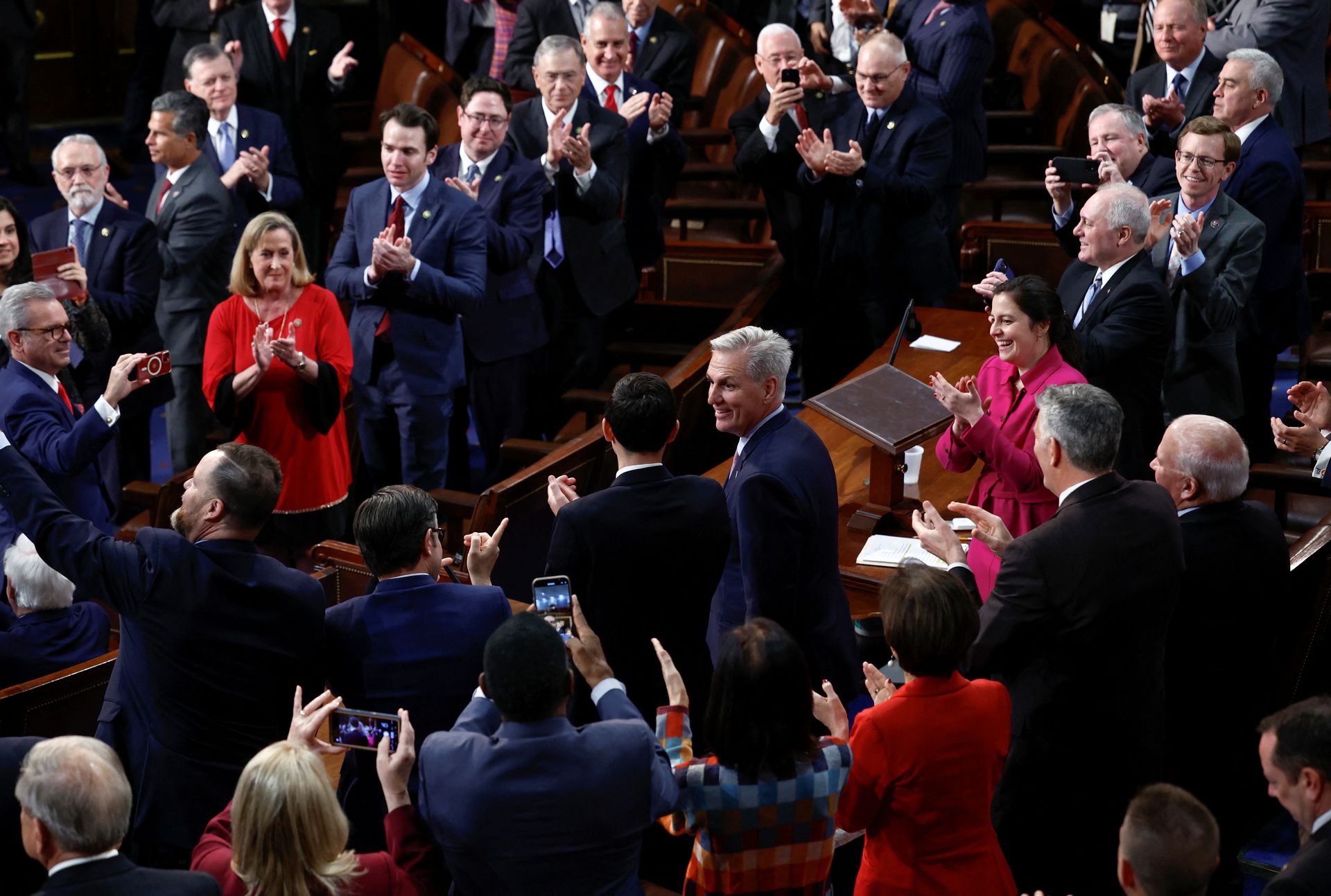 U.S. House Republican leader Kevin McCarthy of California smiles as he is applauded by Republican members of the House after being elected the next speaker of the U.S. House of Representatives in a late night 15th round of voting in the fourth session of the 118th Congress at the U.S. Capitol in Washington, D.C., Jan. 7, 2023.