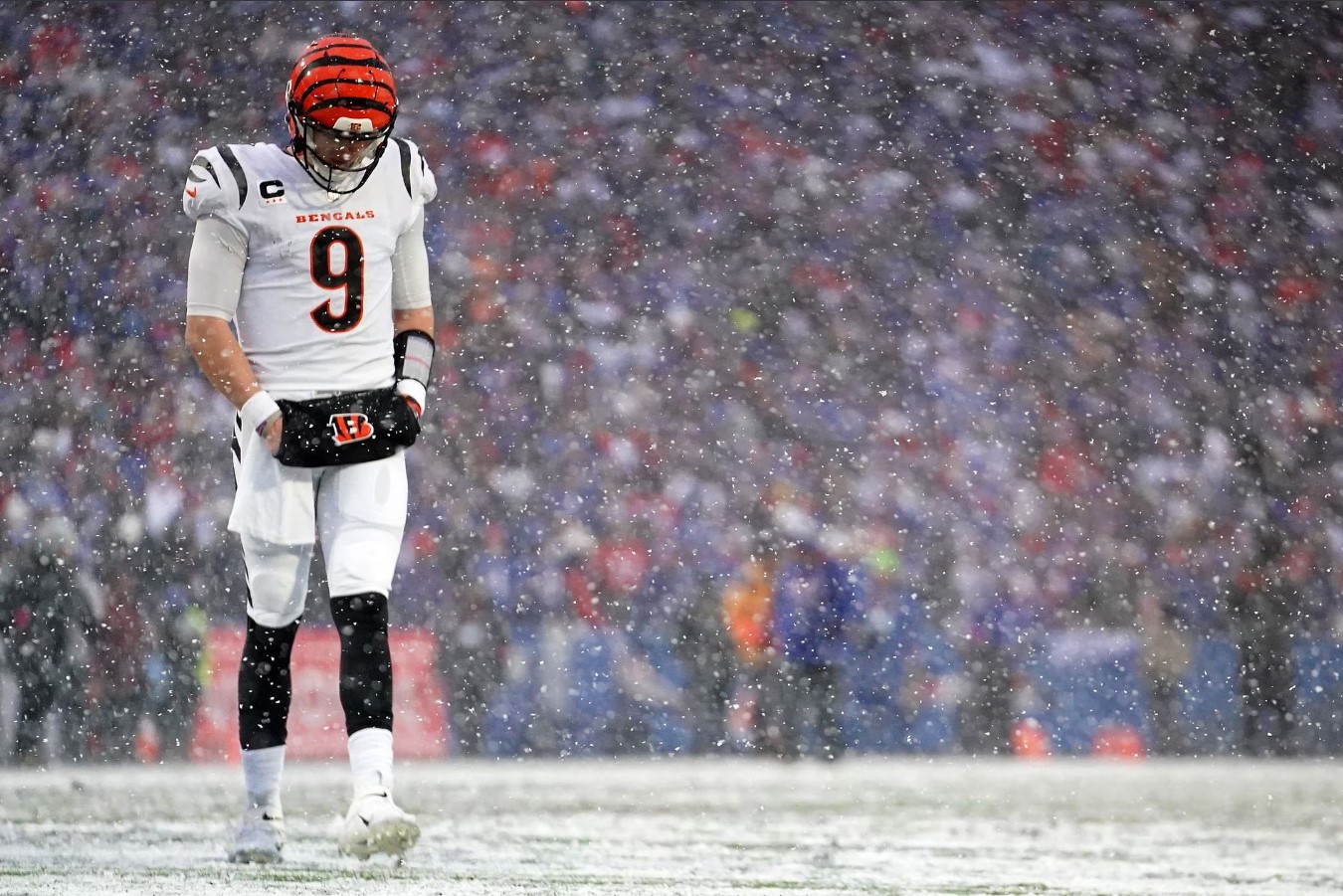 Cincinnati Bengals quarterback Joe Burrow (9) waits for the next play call between plays in the second quarter during an NFL divisional playoff football game between the Cincinnati Bengals and the Buffalo Bills at Highmark Stadium in Orchard Park, New York, Jan. 22, 2023.