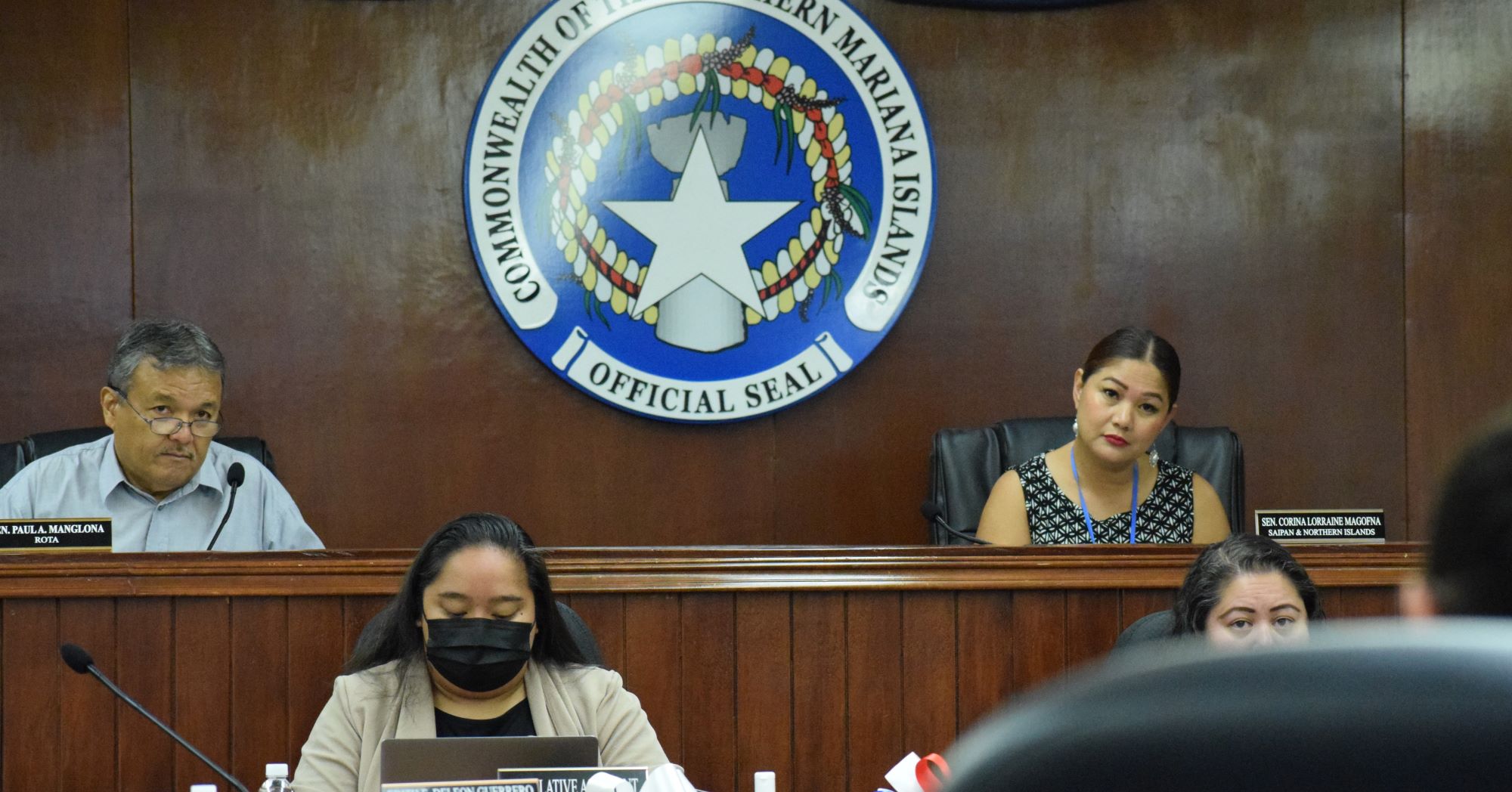 Sen. Paul A. Manglona and Senate Floor Leader Corina Magofna listen during a joint committee meeting with Marianas Visitors Authority officials on Wednesday in the Senate chamber. Also in photo are senior legislative assistant Jolyn Duenas-Tagabuel and Senate legal counsel Antonette Villagomez.