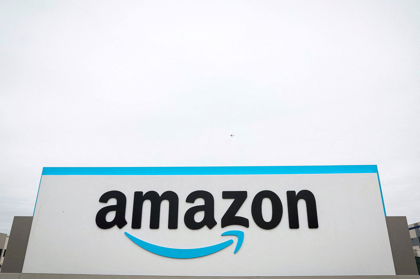 The Amazon logo is displayed on a sign outside the company's LDJ5 sortation center in the Staten Island borough of New York City, April 25, 2022.