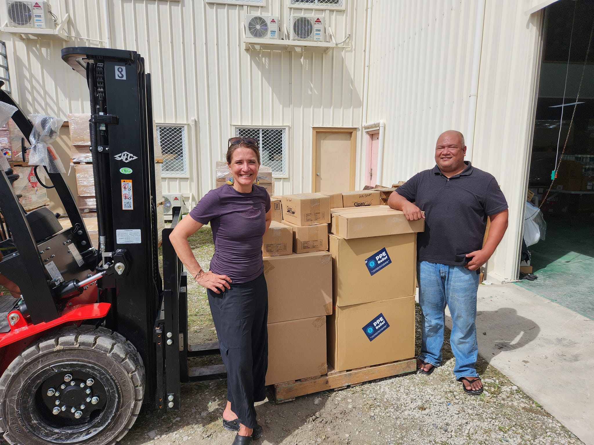 American nurse Deborah Yoder, left, who founded a U.S.-based non-profit known as Nito's Wings, was in Majuro earlier this month to deliver a large donation of healthcare supplies for outer island communities and clinics. She hands over supplies to Aur Atoll Mayor Fred Bukida.