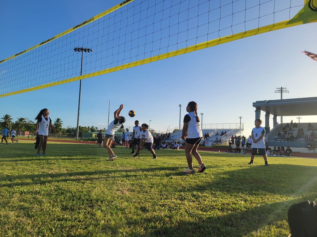 A Sinapalo Elementary School student attempts the return during a 4th-5th grade elementary coed division game of the NMIVA-PSS Interscholastic Volleyball League at the Oleai Sports Complex.