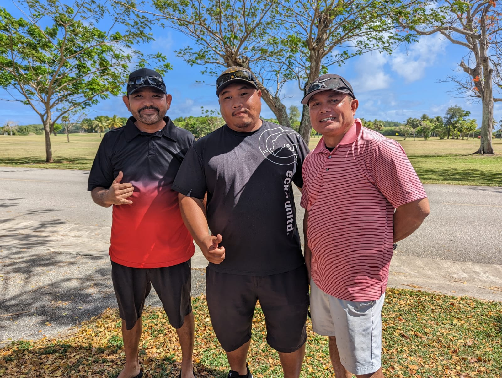 Domingo Atalig, Cal Yamagishi, and John Terlaje pose for a photo following the MGA February Ace of the Month tournament on Sunday at  Laolao Bay Golf & Resort.