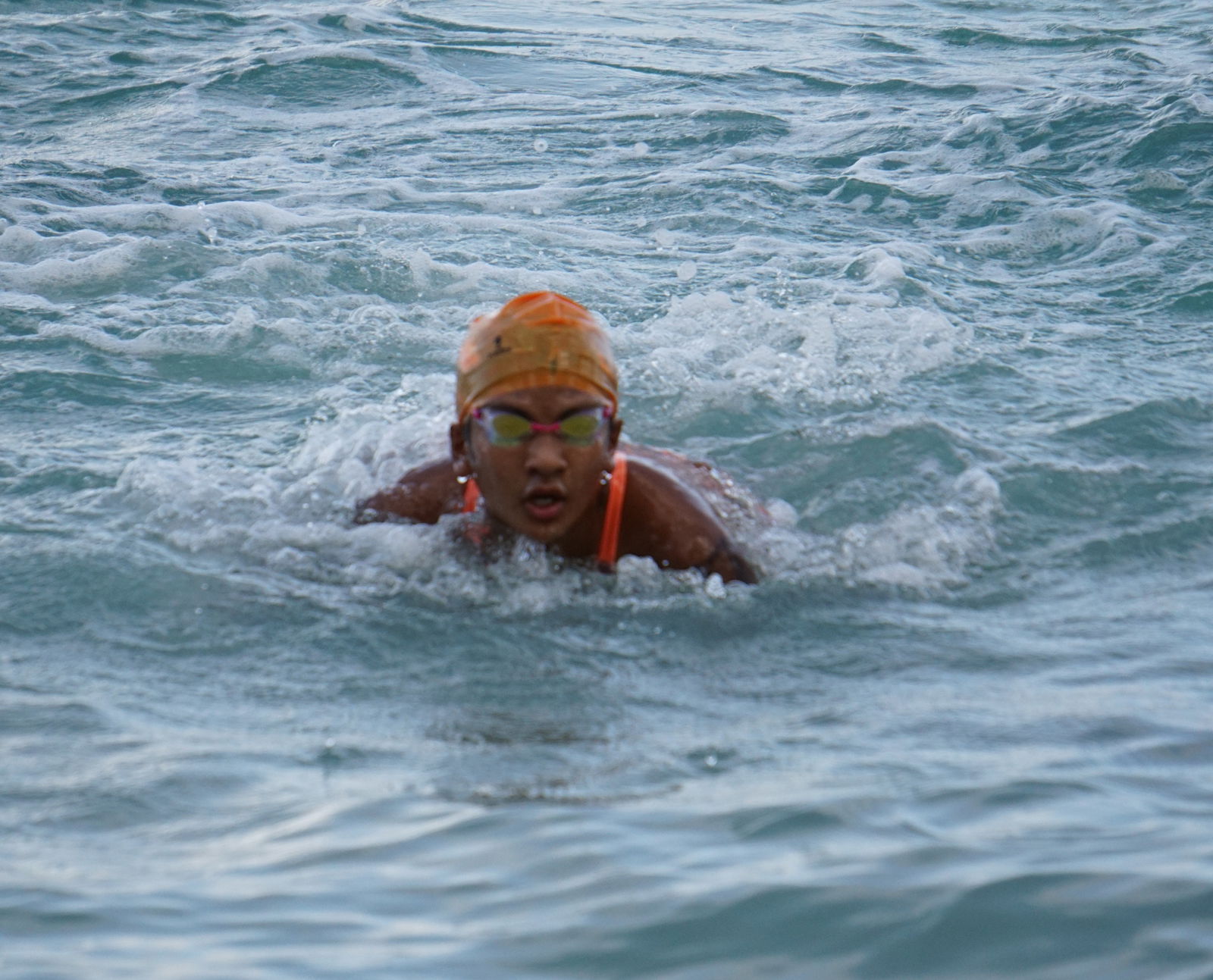 Sari Barman pushes through in the female 1000m race of the Tan Holdings 50th Anniversary Ocean Swim on Saturday at Guma Sakman.