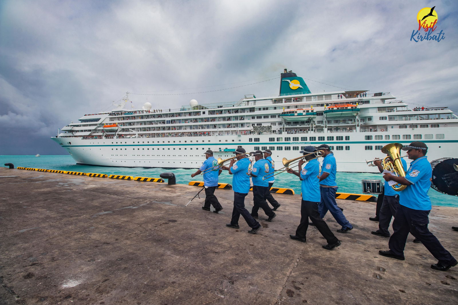 The Kiribati Police Services Brass Band plays a tune to welcome the arrival of a German cruise ship on Feb. 18, 2023.