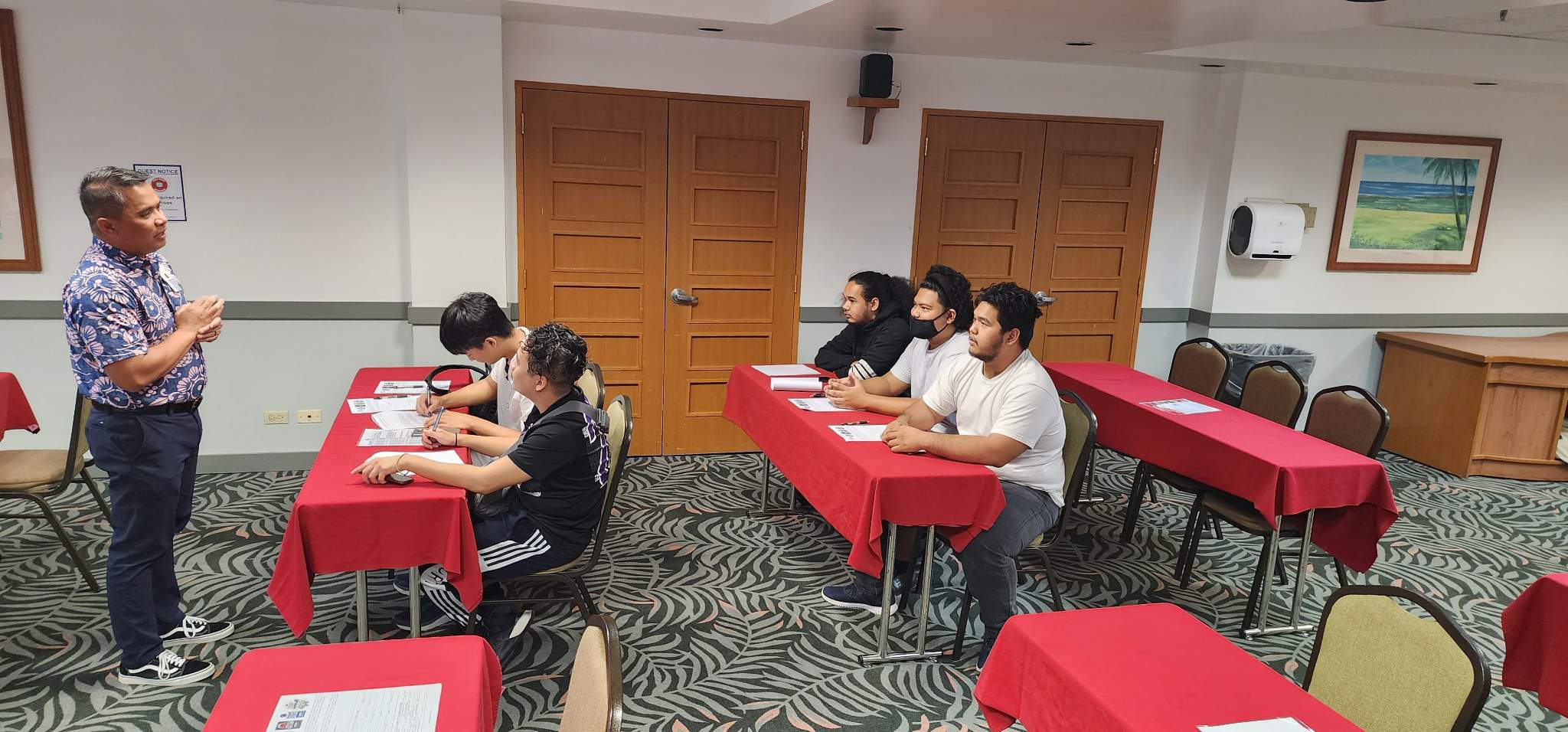 G4S Secure Solutions Guam Integrated Security Strategic Director Ronnie B. Delfin briefs  applicants during a job fair in the Napu Room of the Pacific Islands Club on Saipan, Wednesday, Feb. 8, 2023.