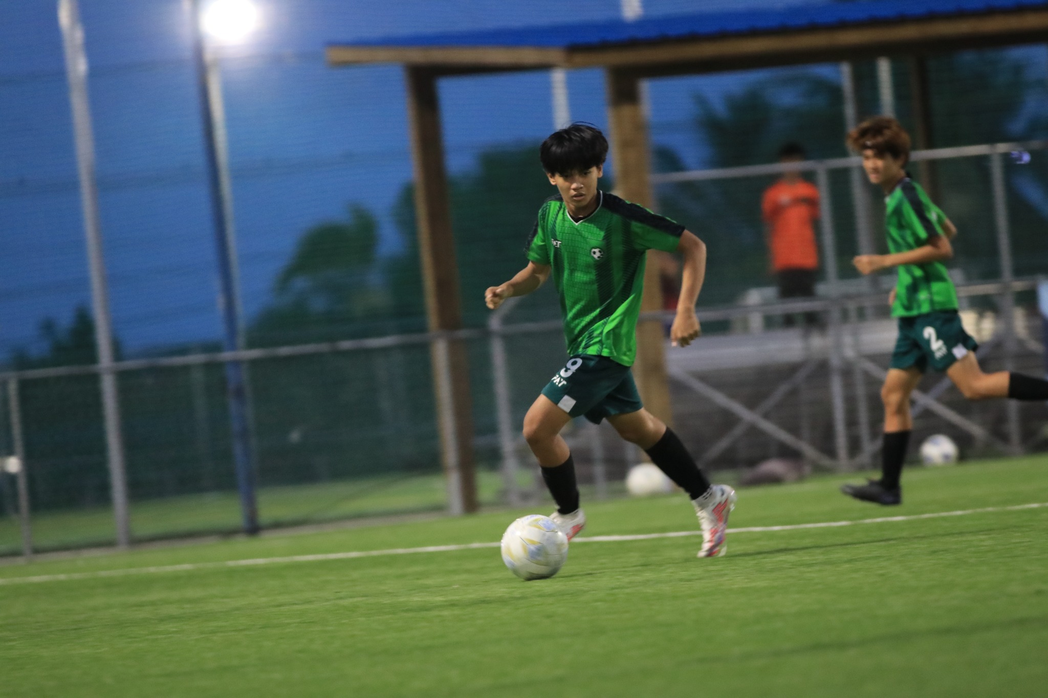 Tan Holdings’ Anthony Austria looks on as he sets up the play during  a U17 boys division game of the TakeCare Youth Soccer League at the NMI Soccer Training Center on Saturday.