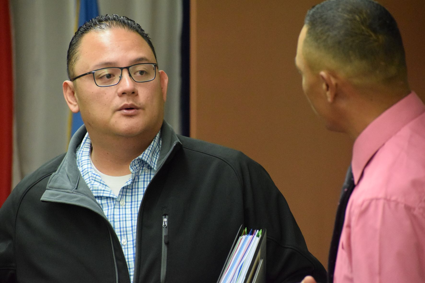Senate Vice President Donald Manglona, left, speaks with Sen. Dennis Mendiola during a break from a Senate session on Tuesday.
